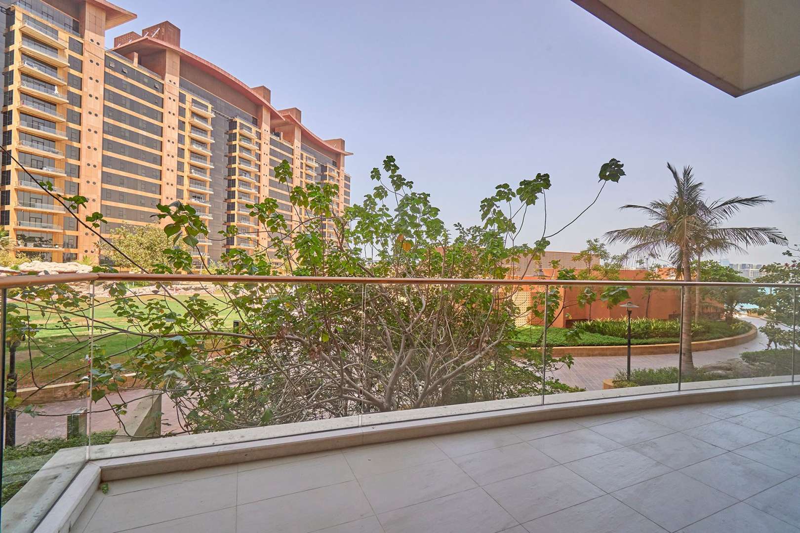 Spacious living room in 1-bedroom apartment, Tiara Residences, Palm Jumeirah, with large windows