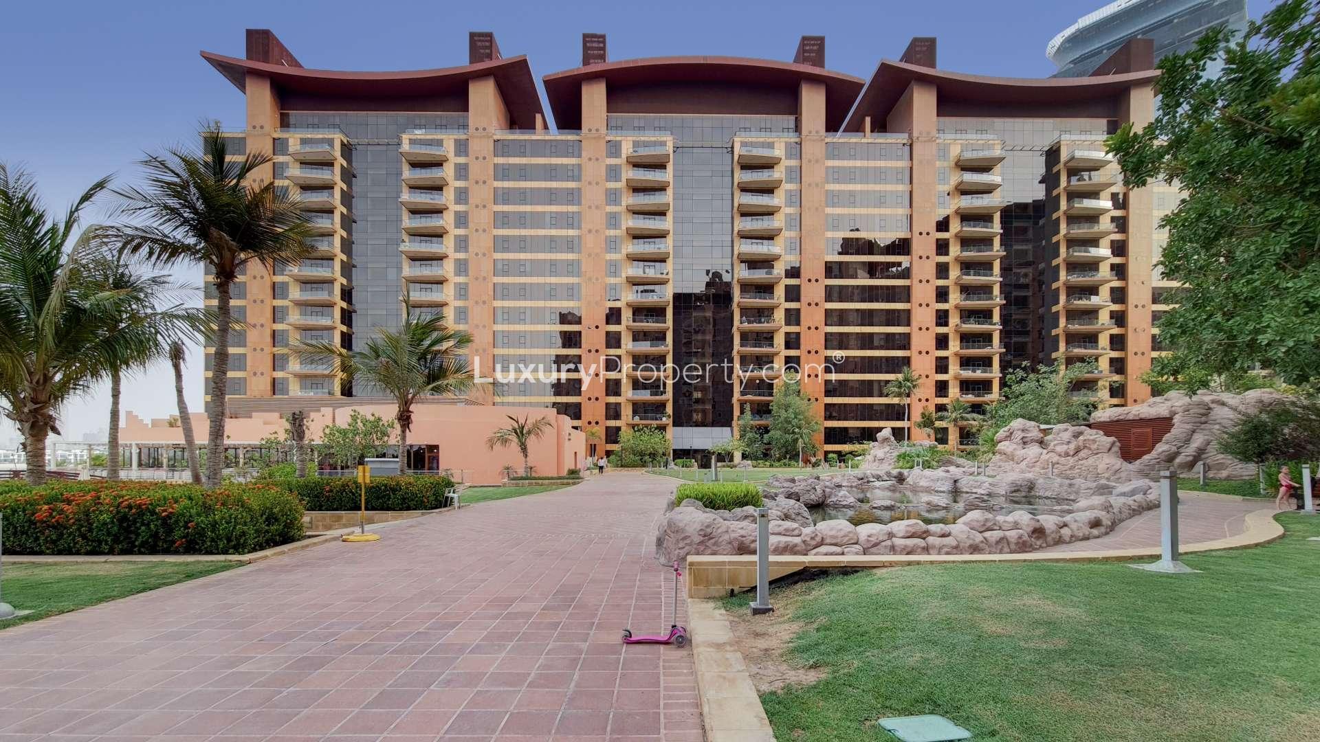 Empty room with large window in Tiara Residence apartment, Palm Jumeirah