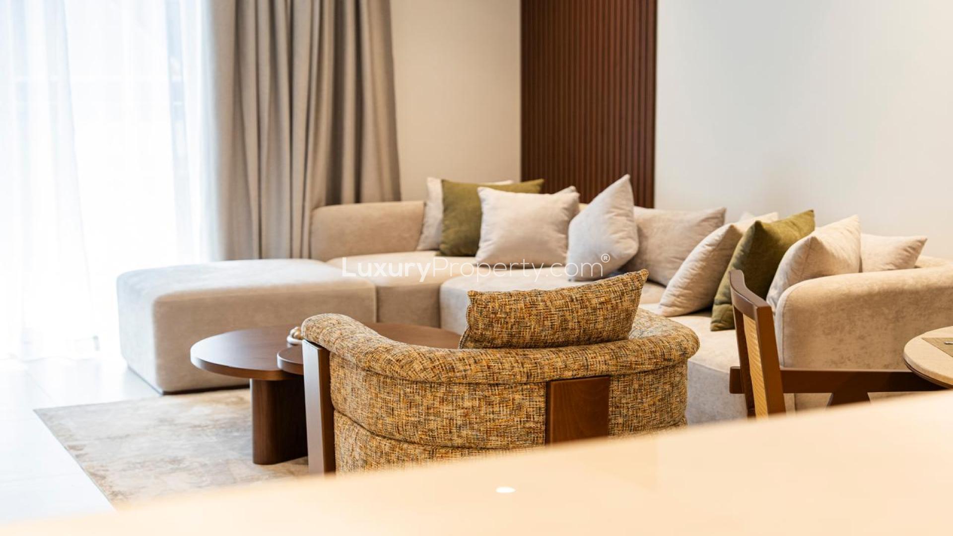 Modern kitchen and dining area in Jumeirah Village Triangle apartment for rent, Milestone Residences