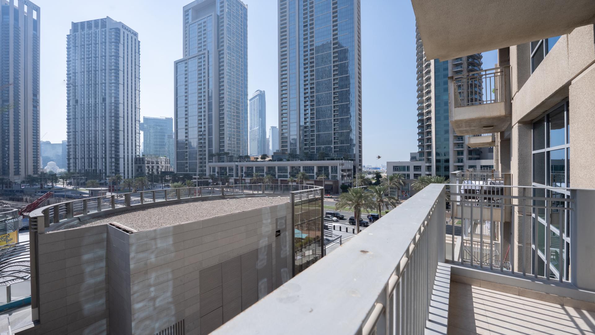 Furnished living room in Standpoint Towers apartment, Downtown Dubai, with modern decor and natural light
