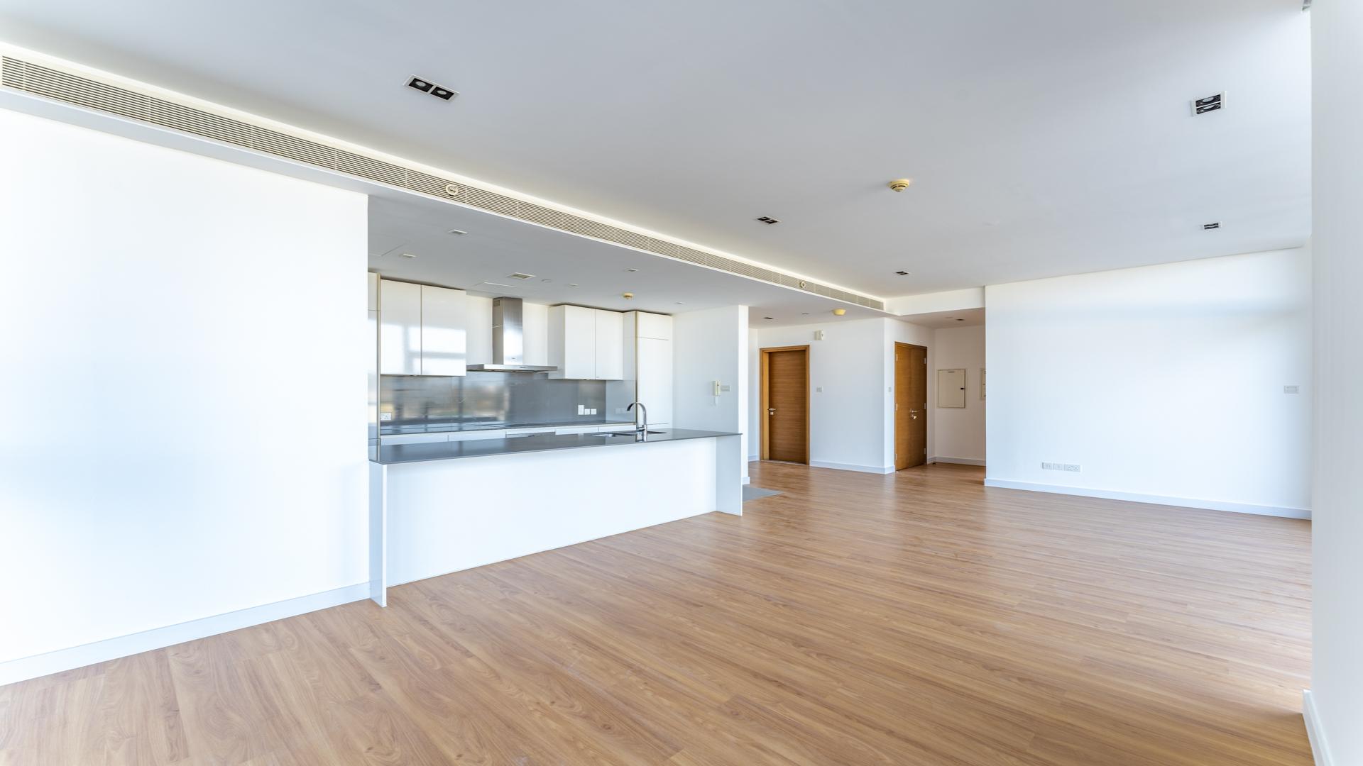 Modern open-plan kitchen and living area in City Walk 1-bedroom apartment, Dubai