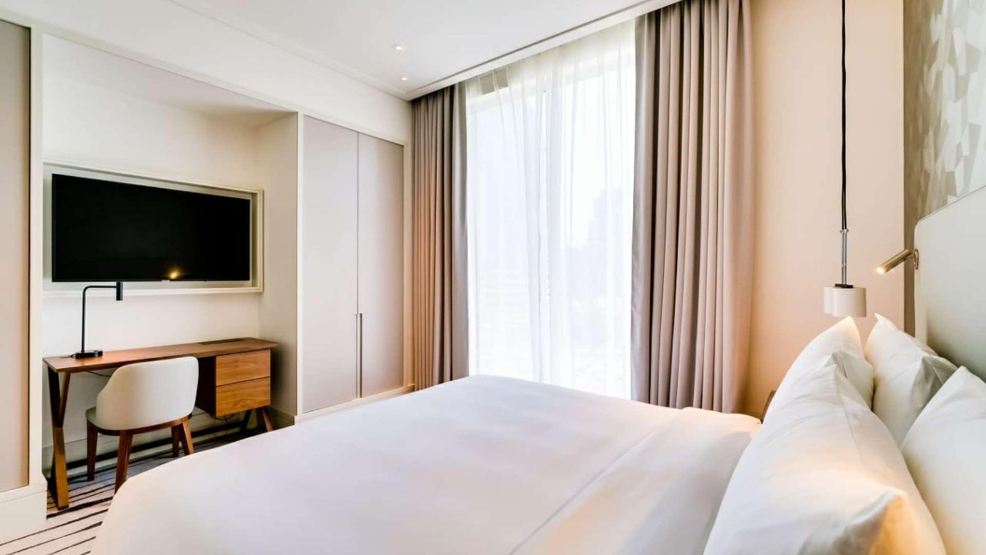 Luxury one-bedroom apartment interior at Vida Residence Downtown Dubai with modern decor and natural light