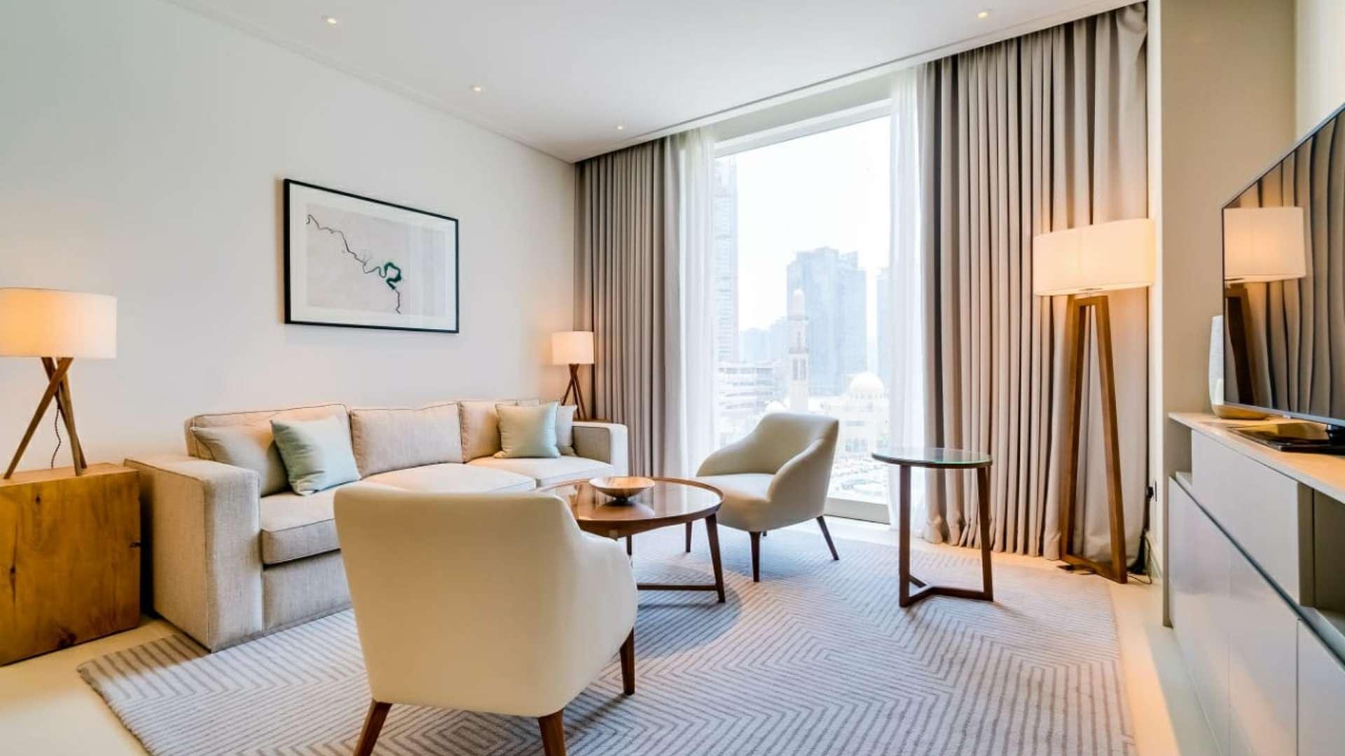 Modern living room in luxury one-bedroom apartment, Vida Residence Downtown Dubai