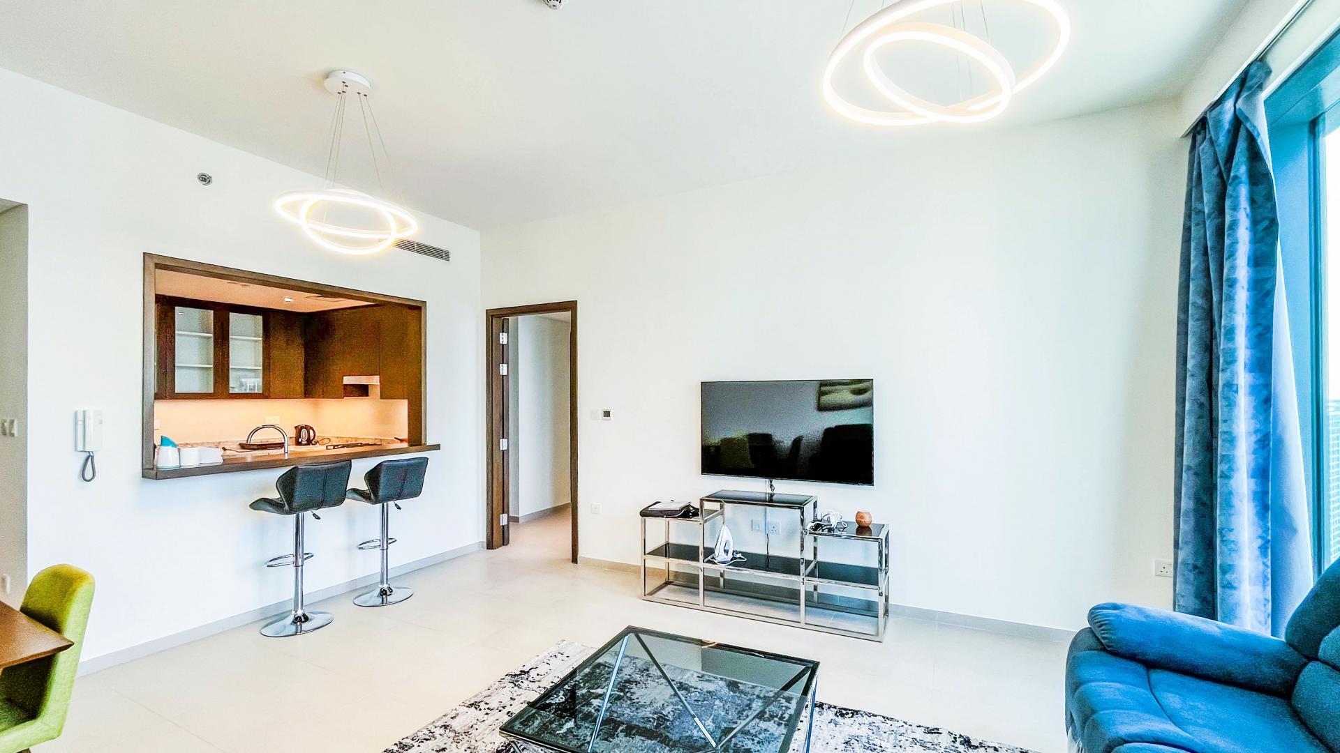 Modern living room in luxury 1-bedroom apartment, BLVD Heights, Downtown Dubai