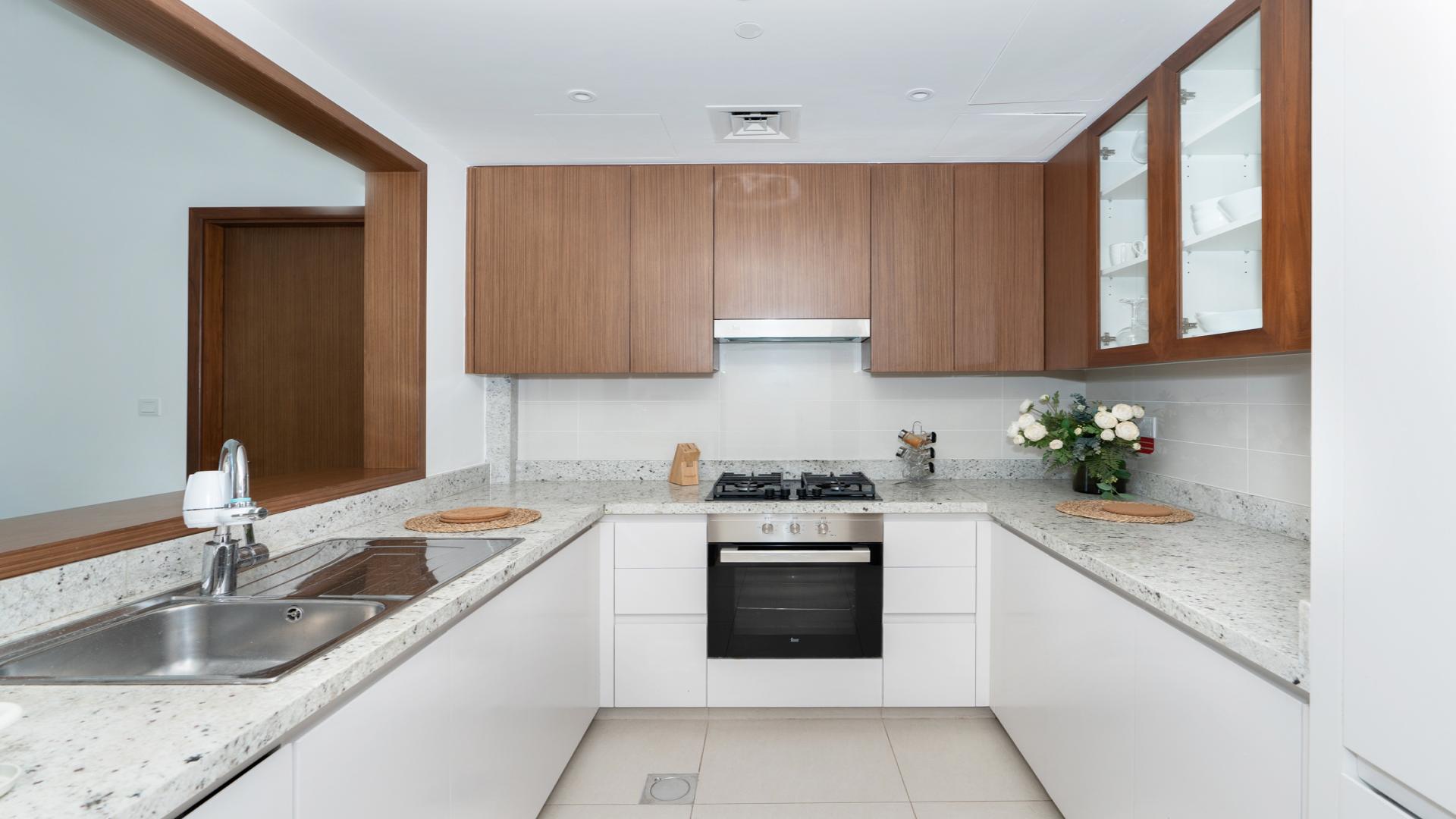 Stylish Downtown Dubai apartment living room with modern decor and cityscape views