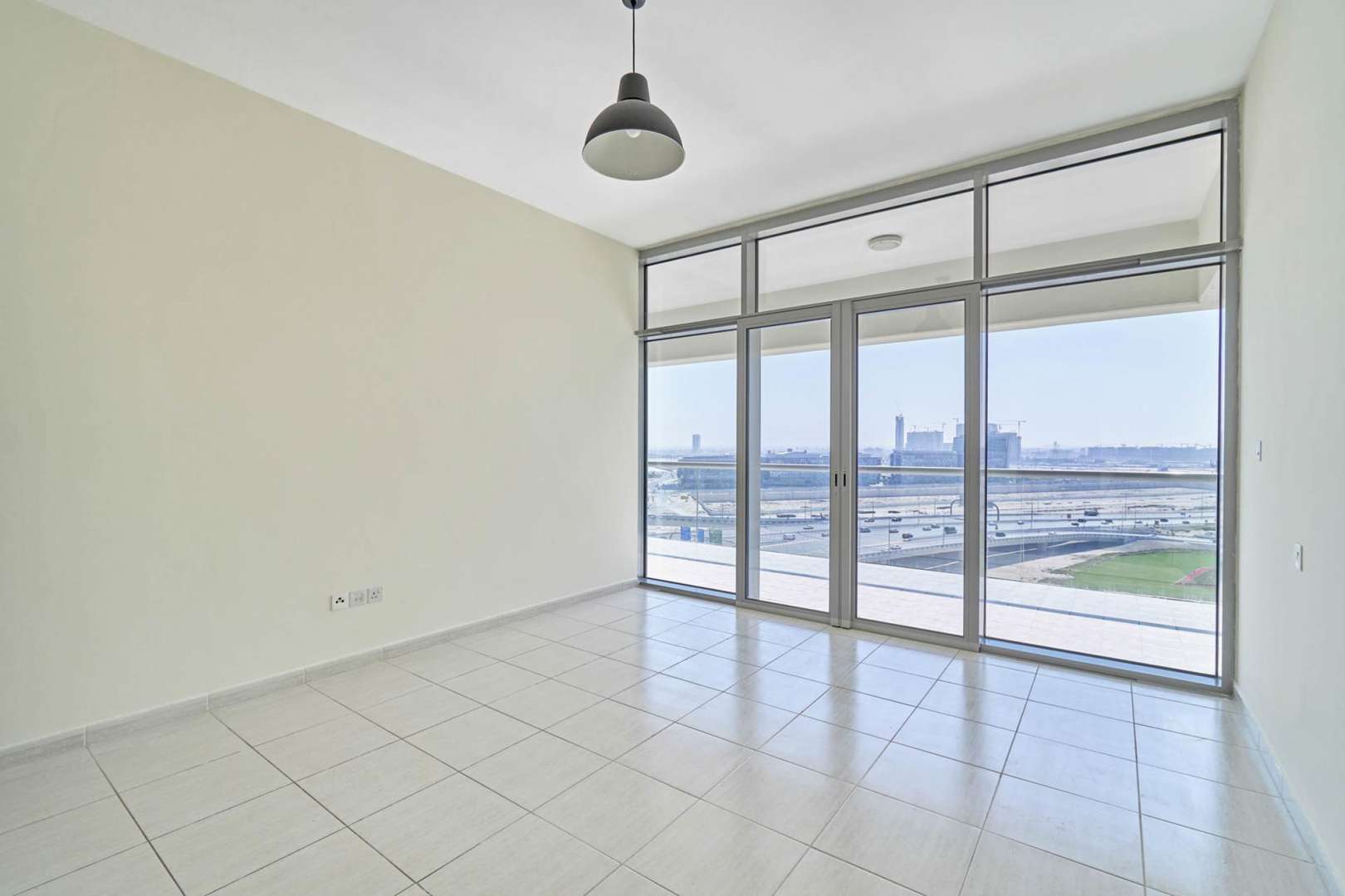 Spacious balcony with city view in Windsor Manor, Business Bay apartment for rent