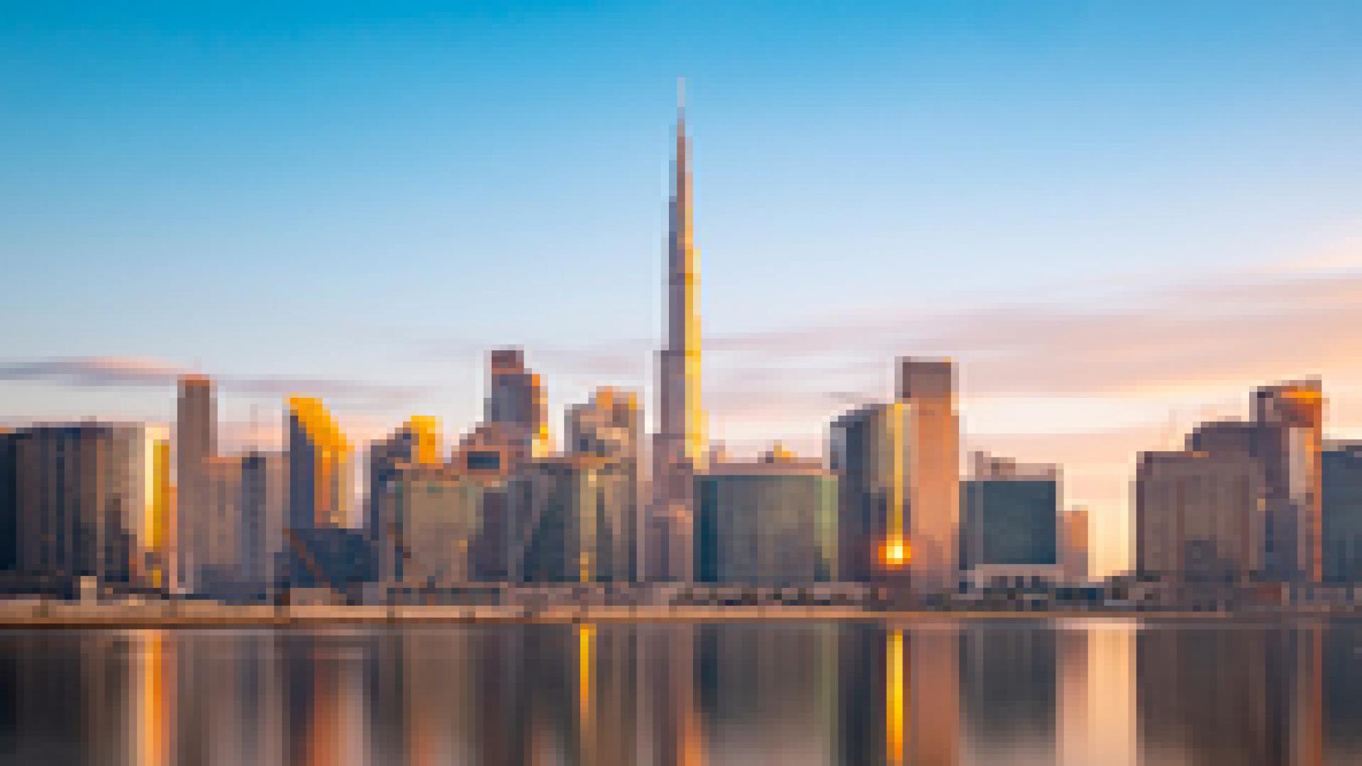 Modern living room in Mina Rashid apartment with stylish furniture and large windows