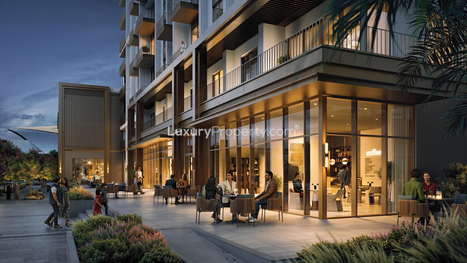 N/A,Exterior view of Altus apartments near Creek Beach, featuring outdoor seating and evening ambiance