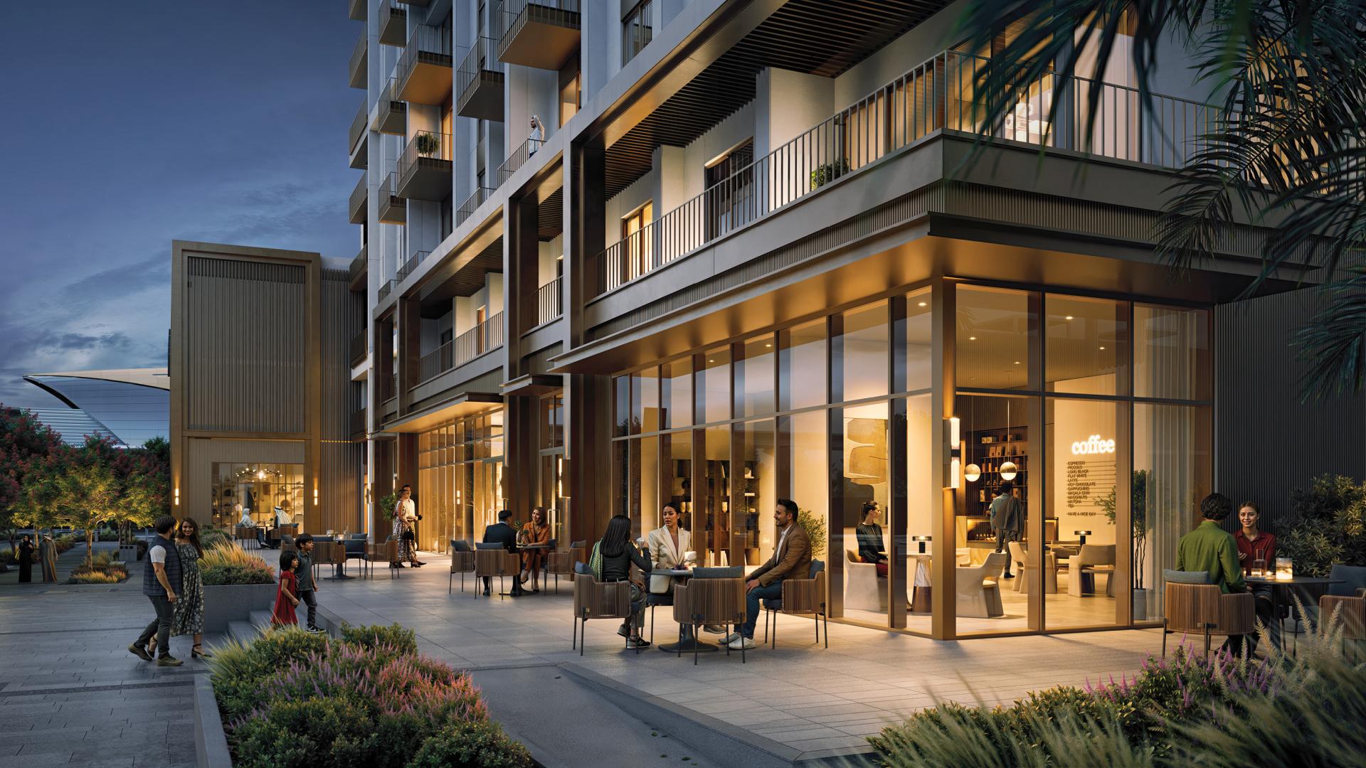 N/A,Exterior view of Altus apartments near Creek Beach, featuring outdoor seating and evening ambiance