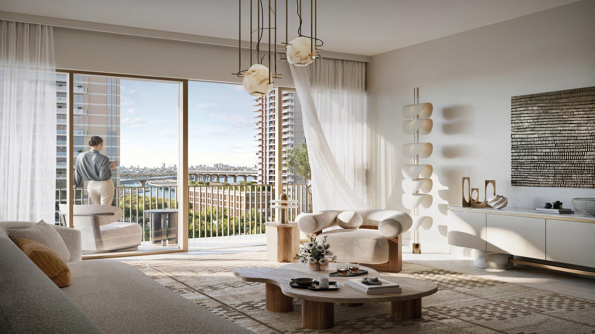 Modern living room in Altus apartment, Dubai Creek Harbour, with balcony and stylish decor