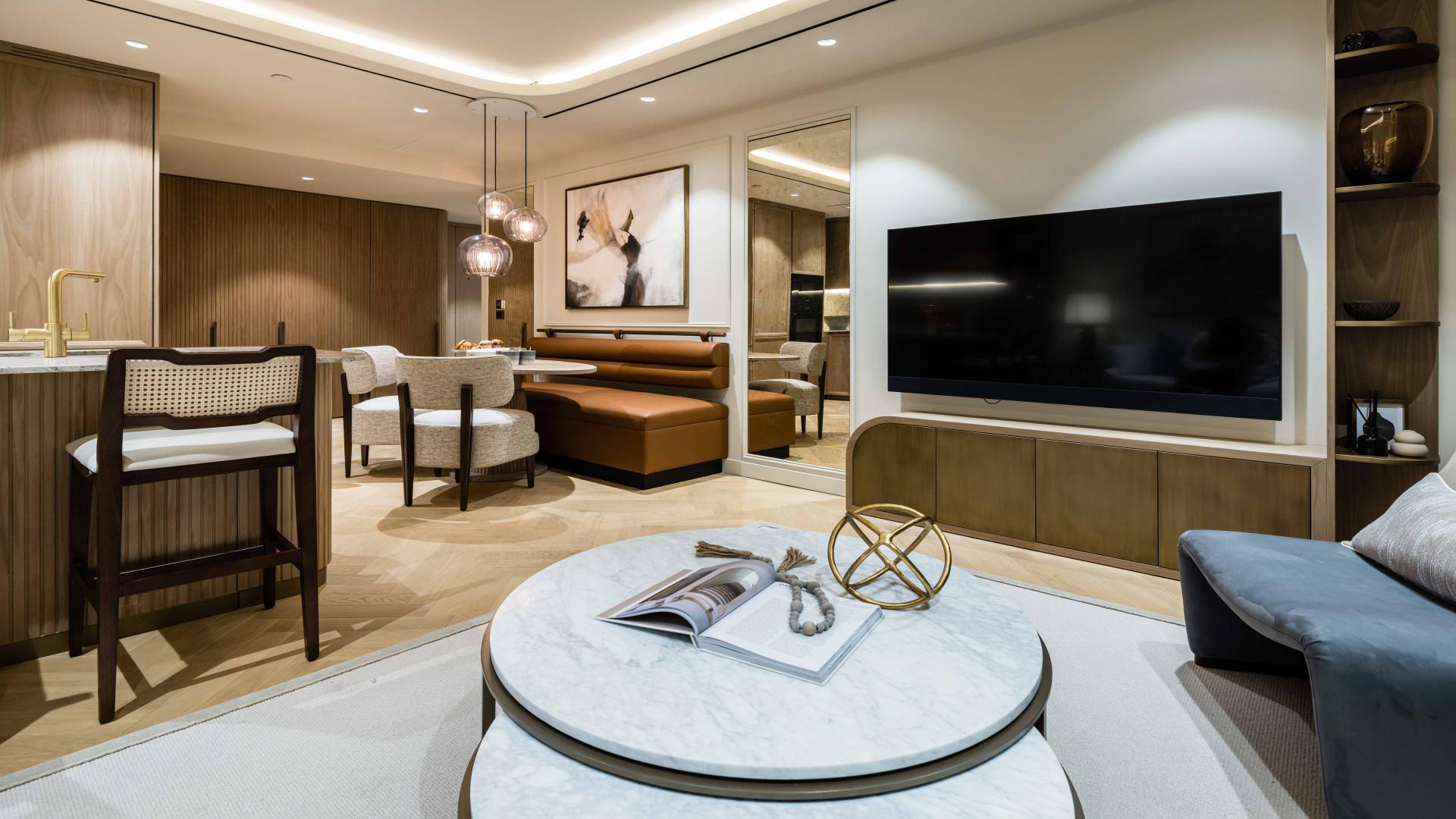 Luxury Soho penthouse living room with modern decor, elegant lighting, and city views