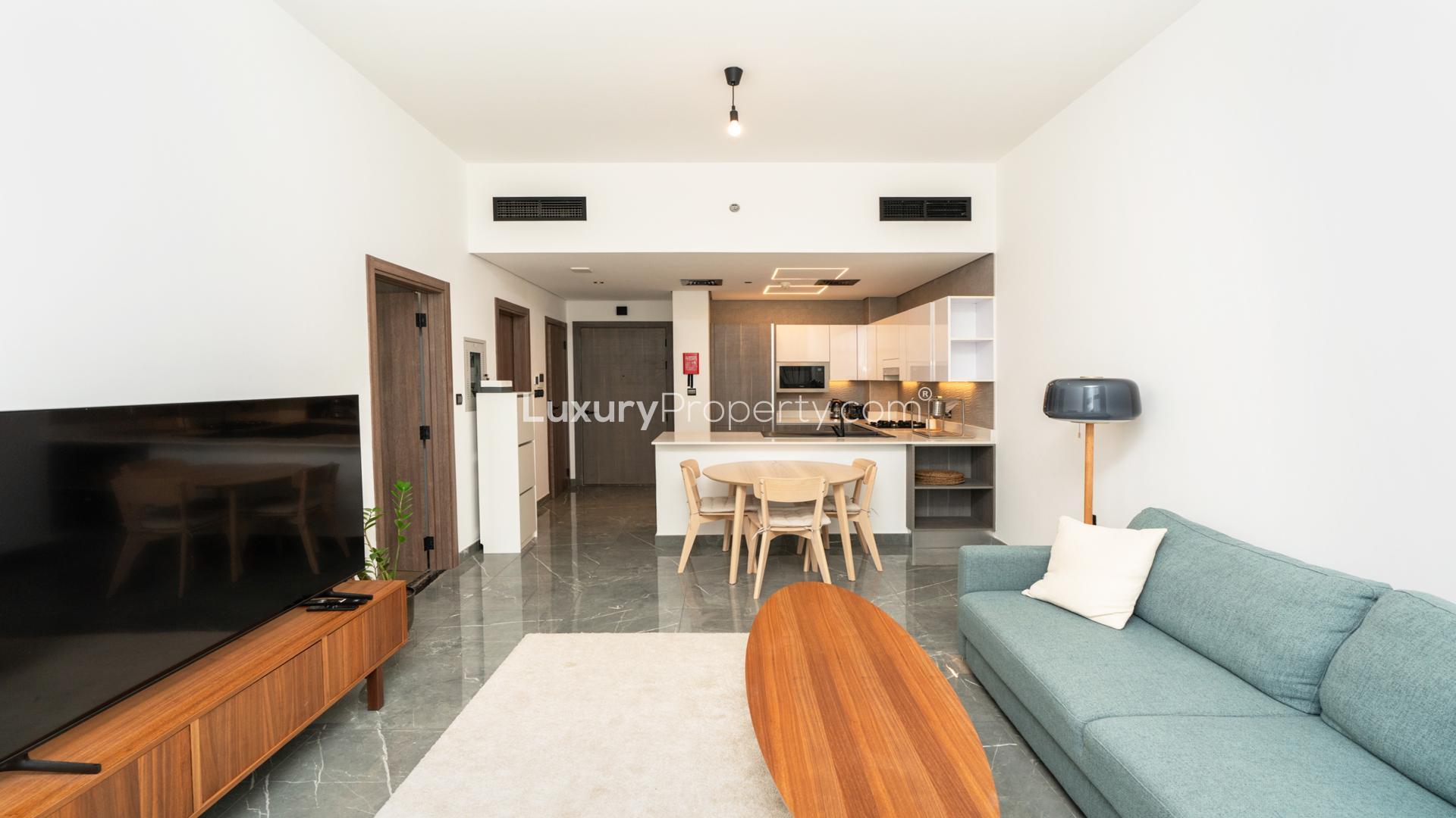 Modern living room in 1-bedroom apartment, Joya Blanca Residences, Arjan, featuring sleek furnishings
