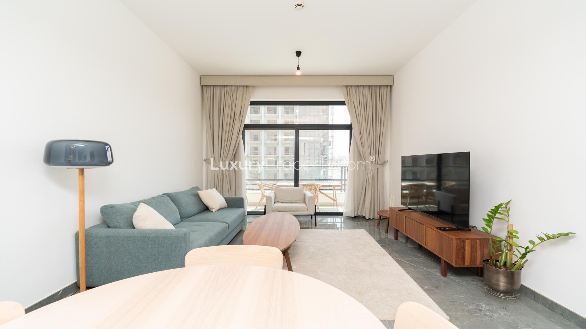 Modern kitchen in 1-bedroom apartment, Joya Blanca Residences, Arjan. Sleek design and appliances