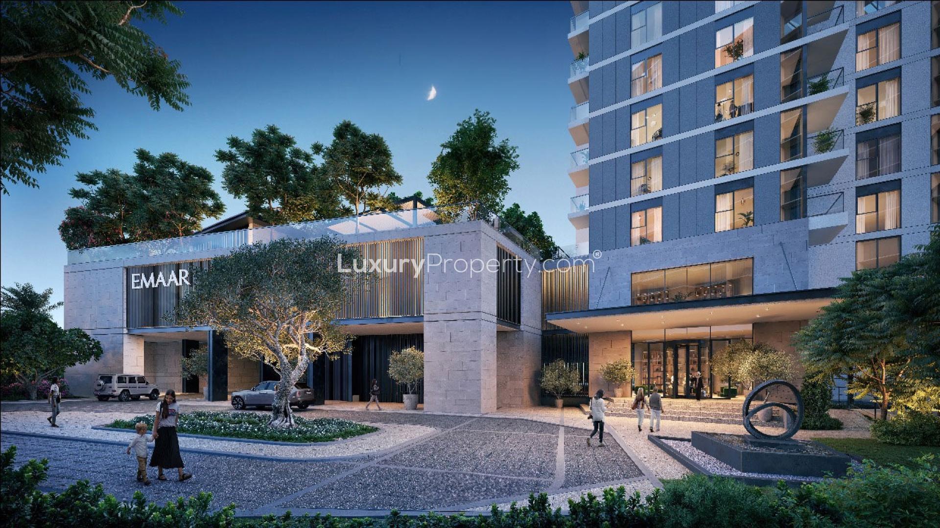 Premium Golf Hillside apartment building, Dubai Hills Estate, evening view with surrounding greenery