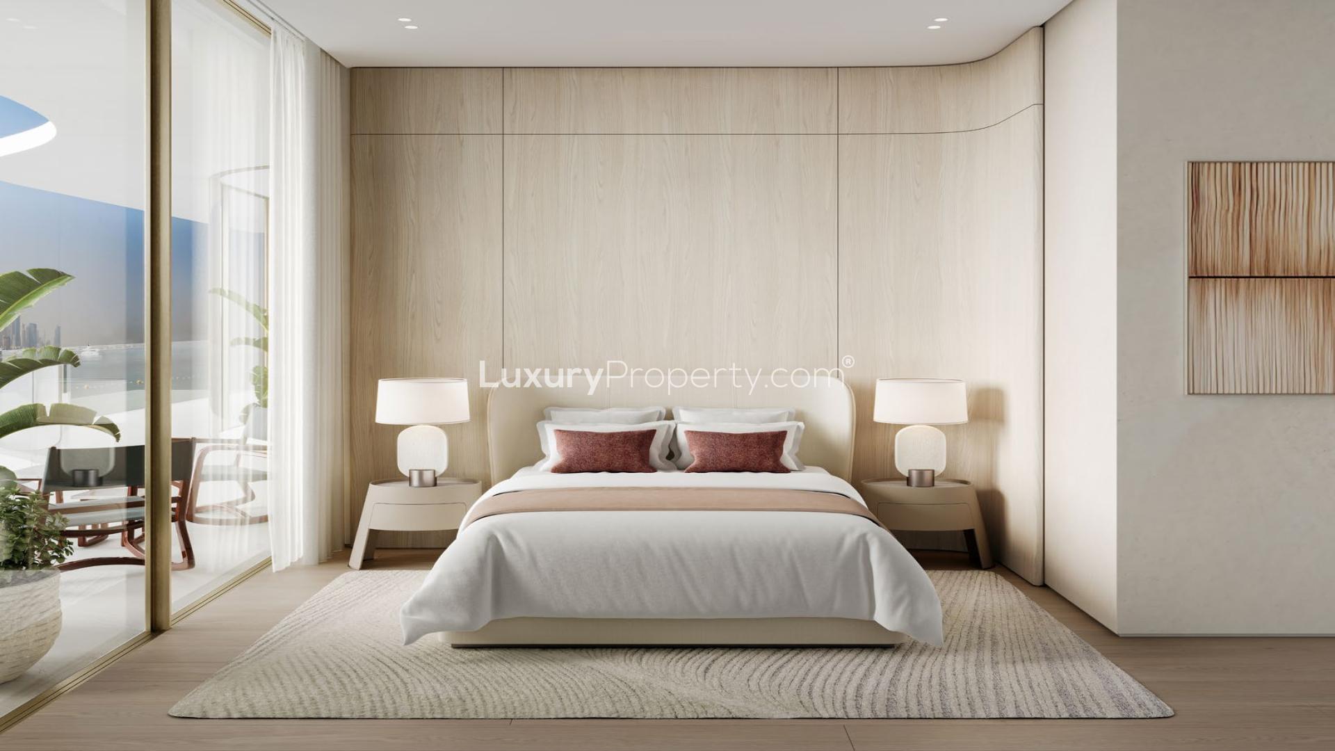 Modern bedroom with large windows, stylish decor, and balcony view in Dubai Harbour apartment