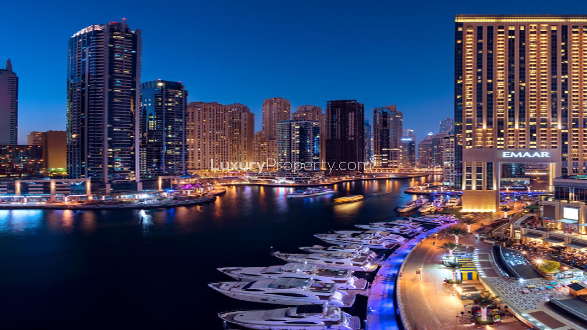 Luxurious lobby of Marina Cove apartment, Dubai Marina, with elegant decor and large windows