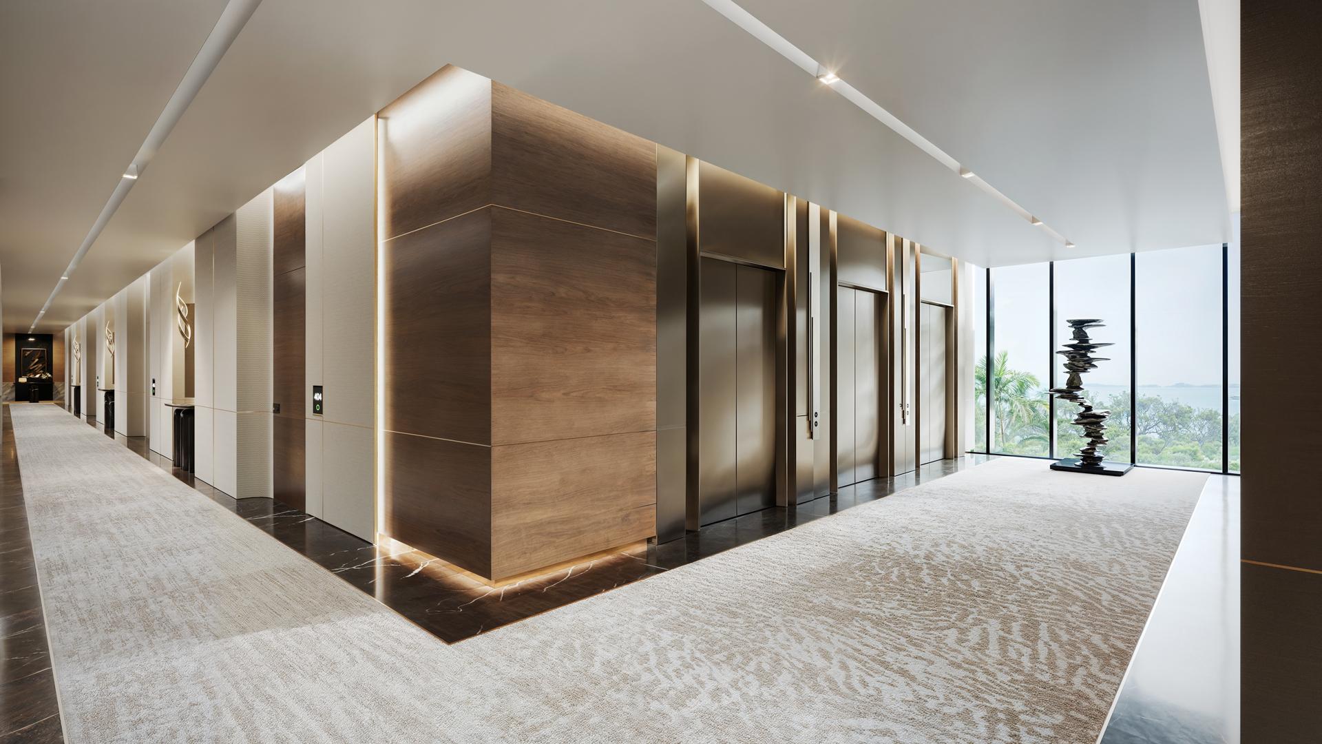 Luxurious bathroom in Trump Hotel Oman suite, featuring elegant marble finishes and modern fixtures