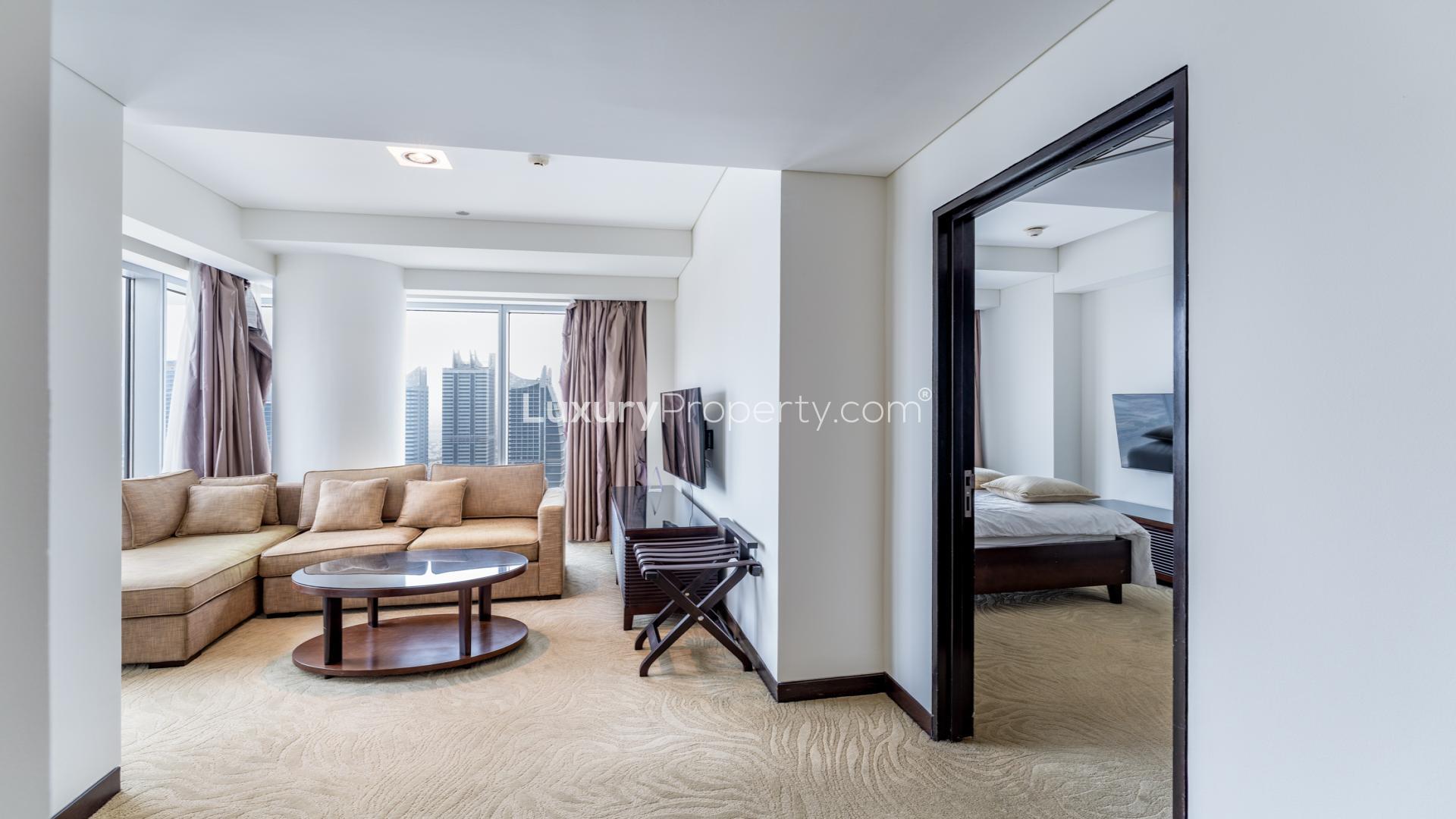 Elegant furnished living room with marina view in Dubai Marina apartment for sale