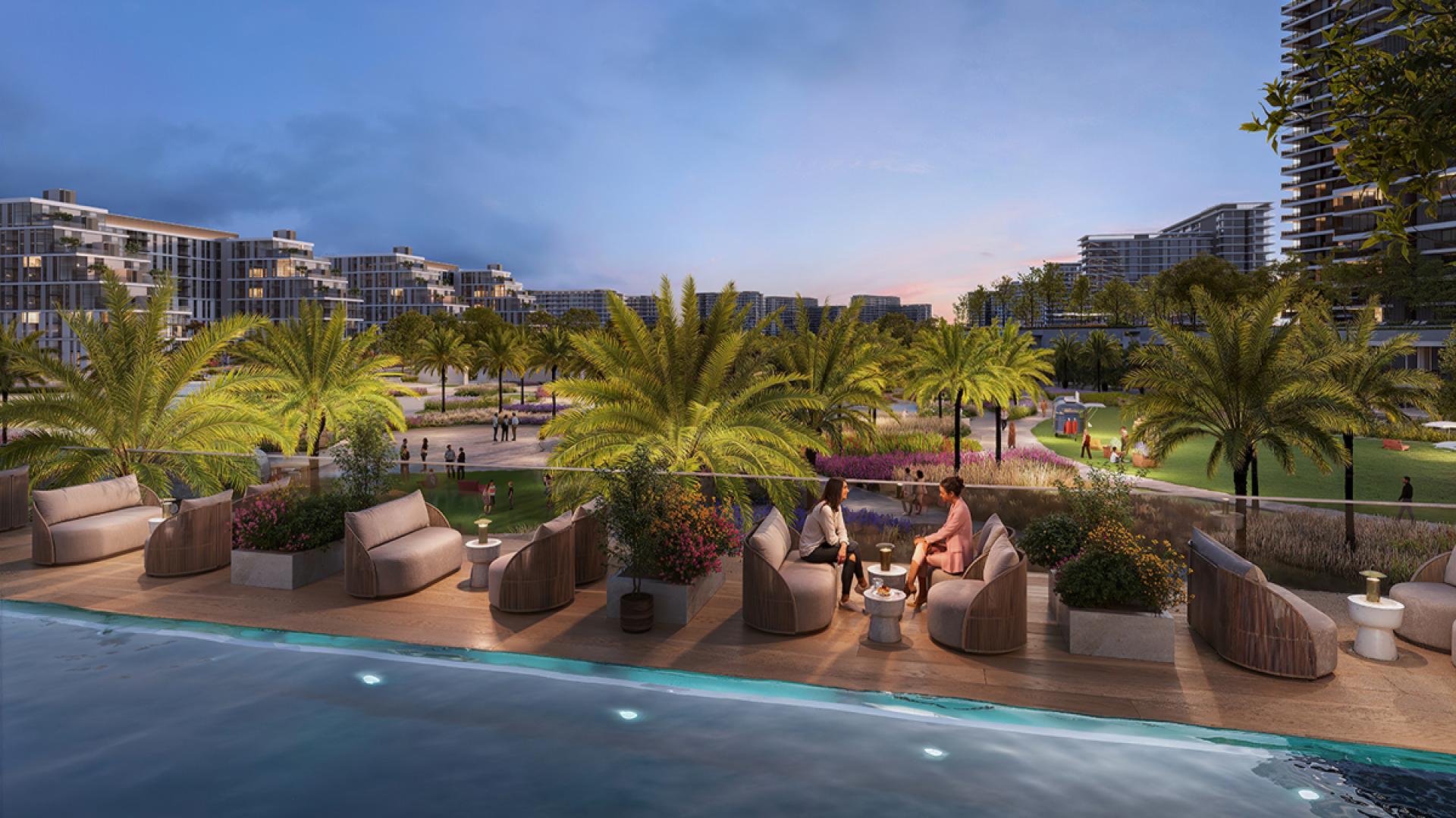 High-floor Dubai Hills Estate apartment living room with city view and modern decor