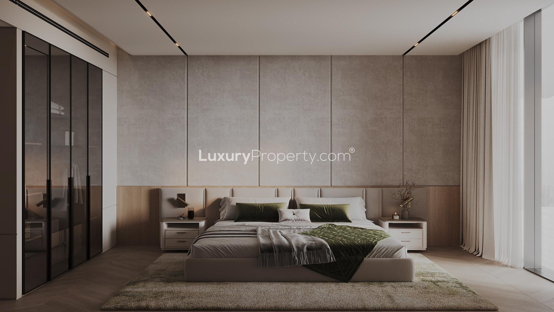 "Modern bedroom interior in stylish Binghatti Grove apartment, Jumeirah Village Circle for sale.",Stylish Binghatti Grove apartment exterior with poolside cabanas in Jumeirah Village Circle