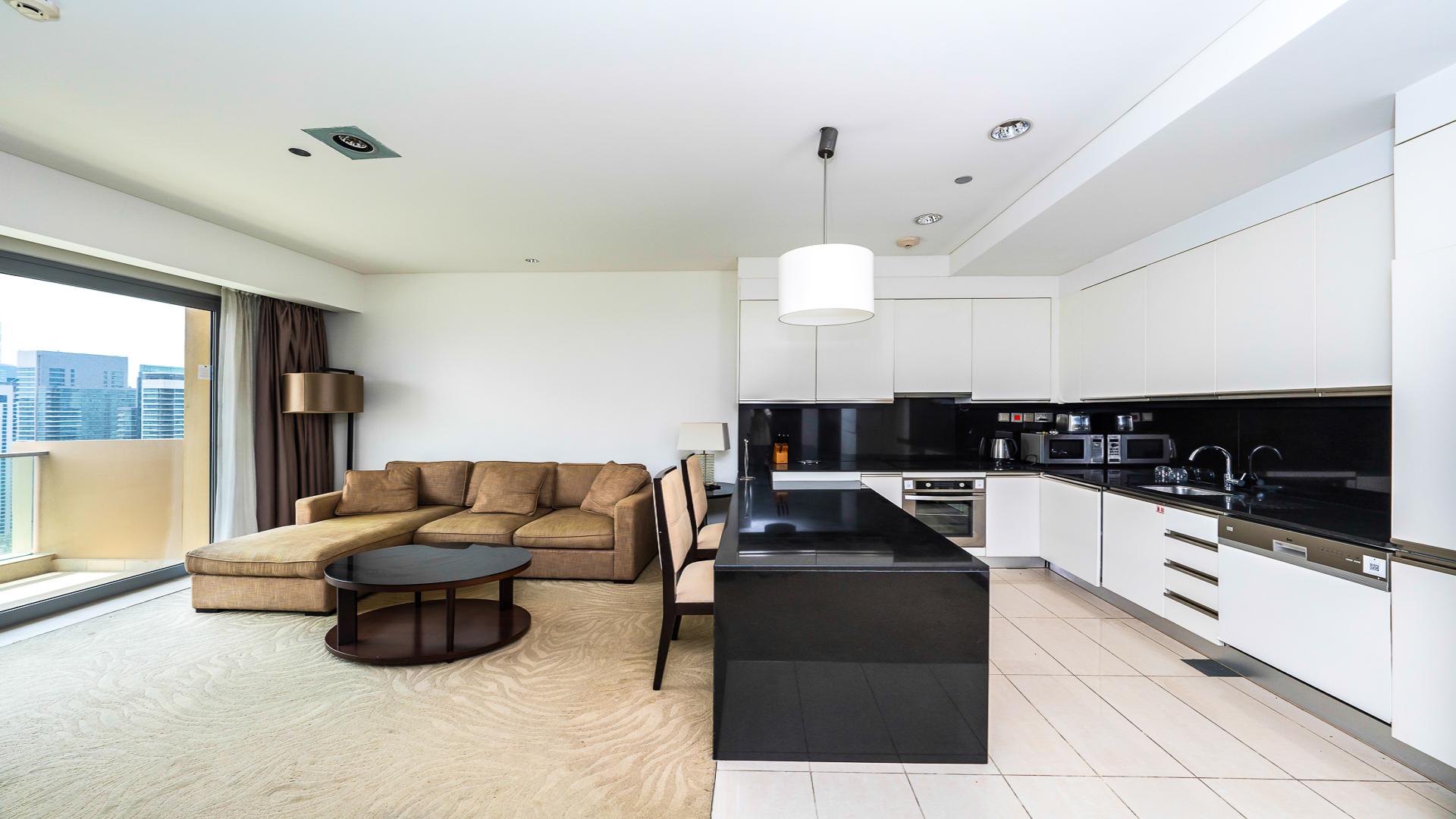 Aerial view of Dubai Marina waterfront and pool near JW Marriott Hotel