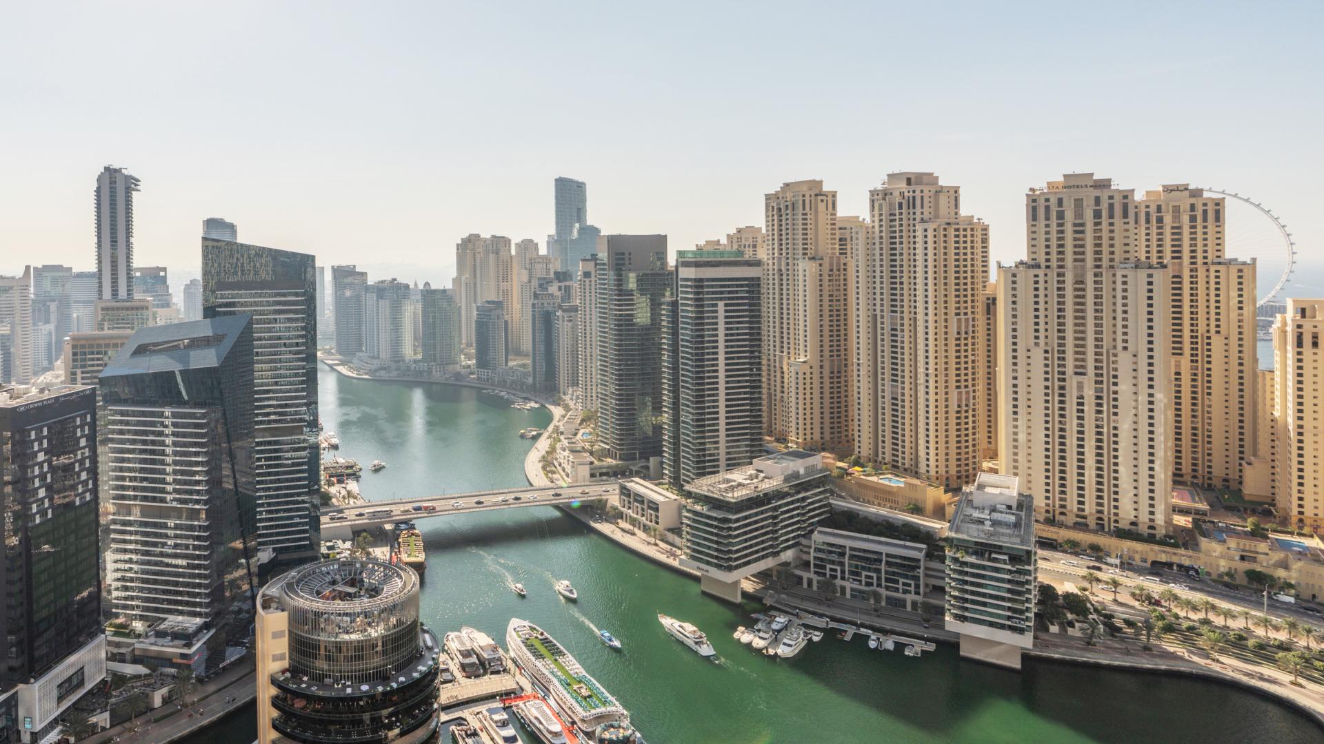 Modern one-bedroom apartment interior with city view in Dubai Marina, JW Marriott Hotel