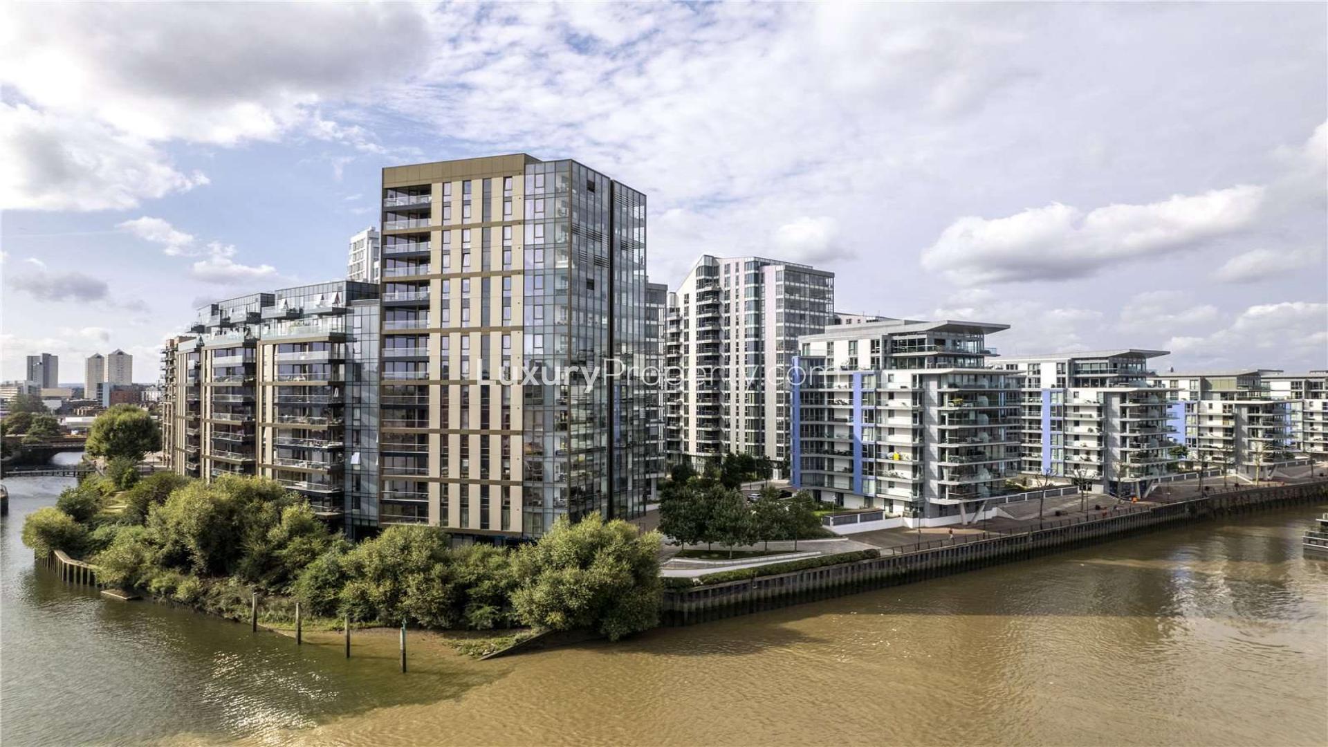 Modern living room in Nine Eastfields apartment, Wandsworth, with balcony and stylish decor