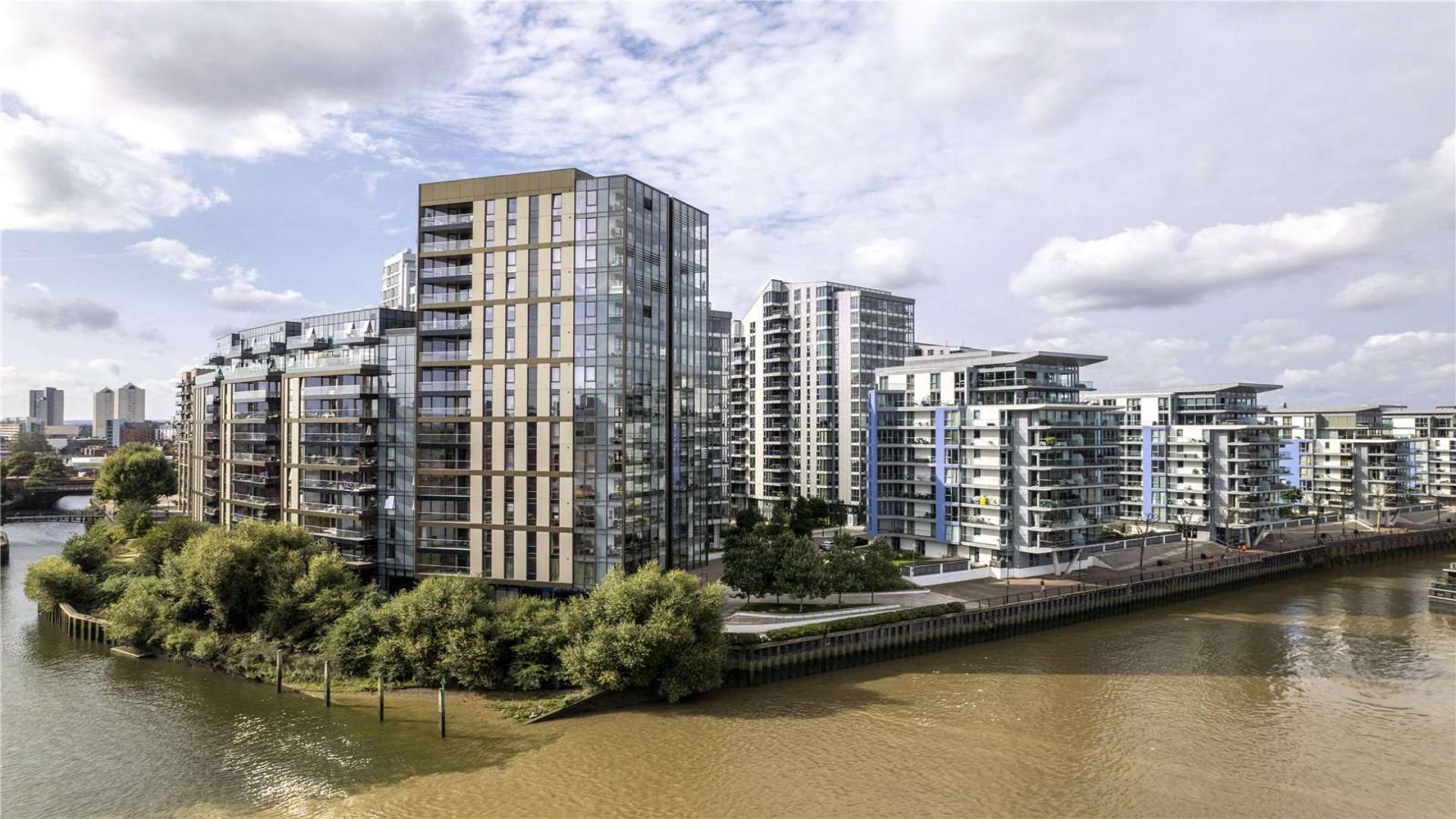 Modern living room in Nine Eastfields apartment, Wandsworth, with balcony and stylish decor