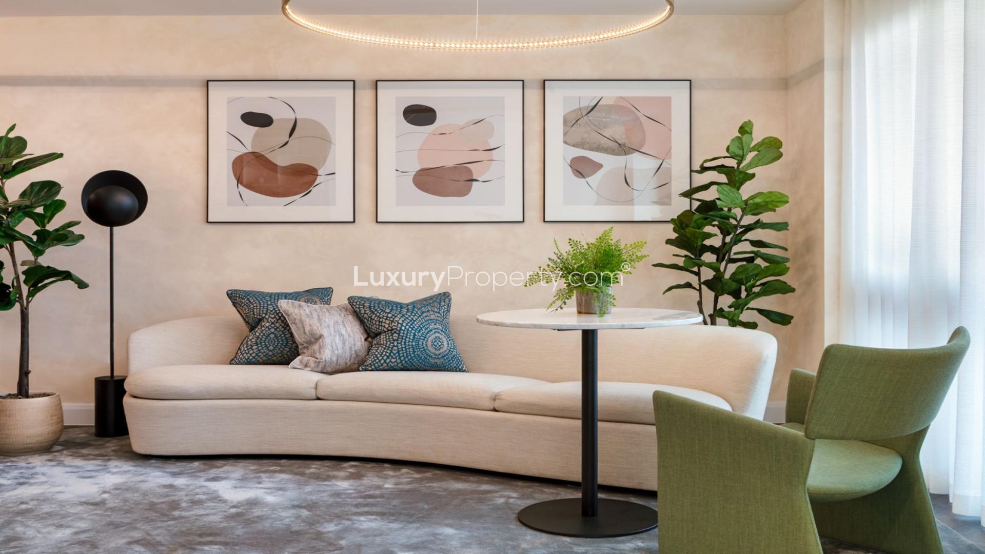 Modern lounge area in premium Queens Cross apartment, Western Gateway, Royal Docks, London