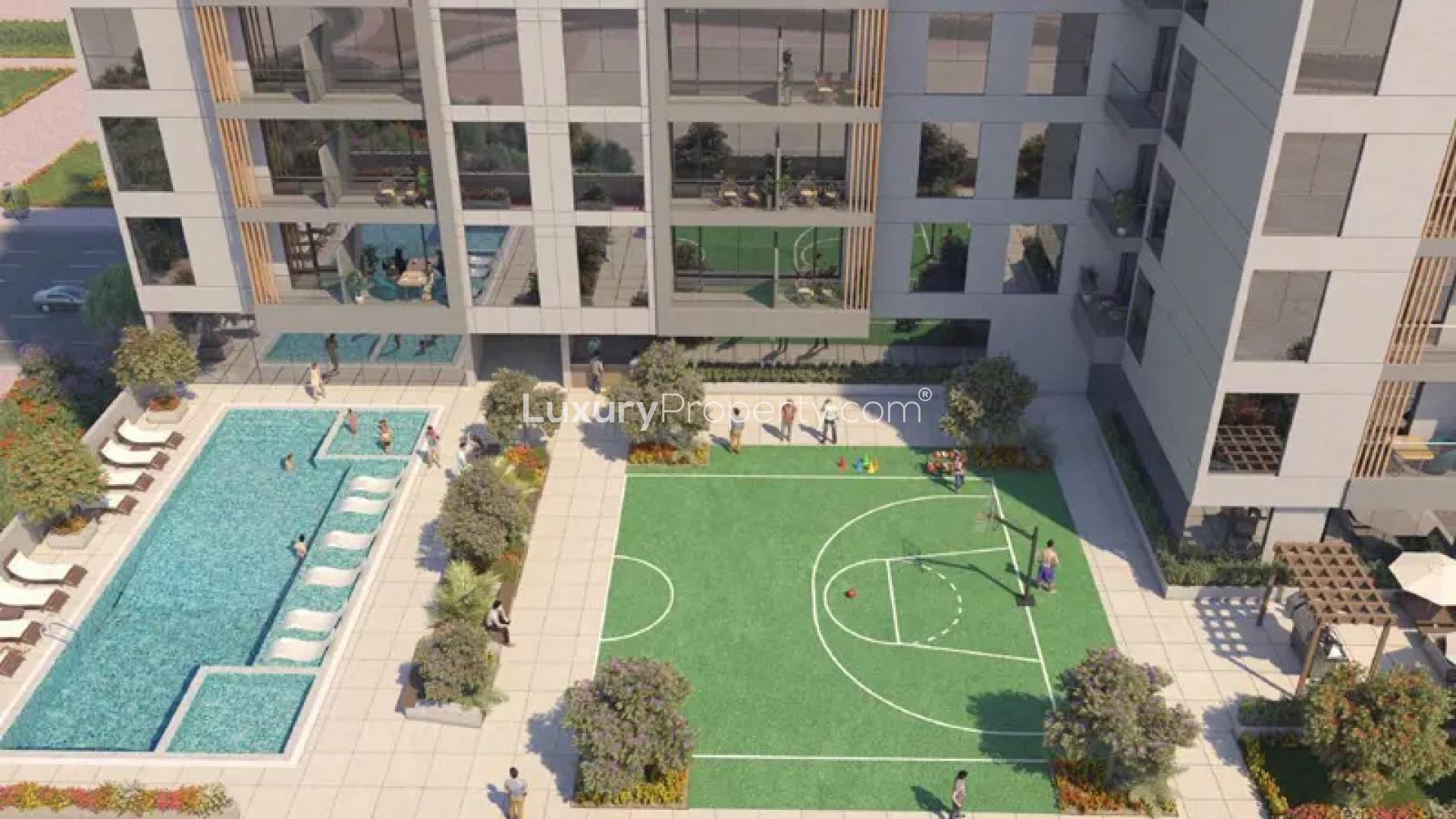 Modern living room in Aura by Grovy apartment, JVC, with skyline views and elegant decor