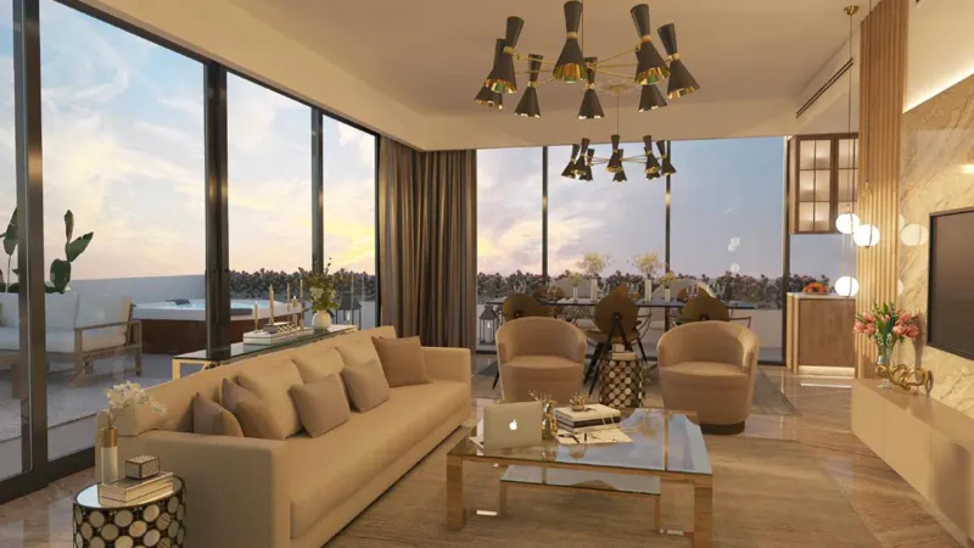 Modern living room and kitchen in 1-bedroom Aura apartment, Jumeirah Village Circle