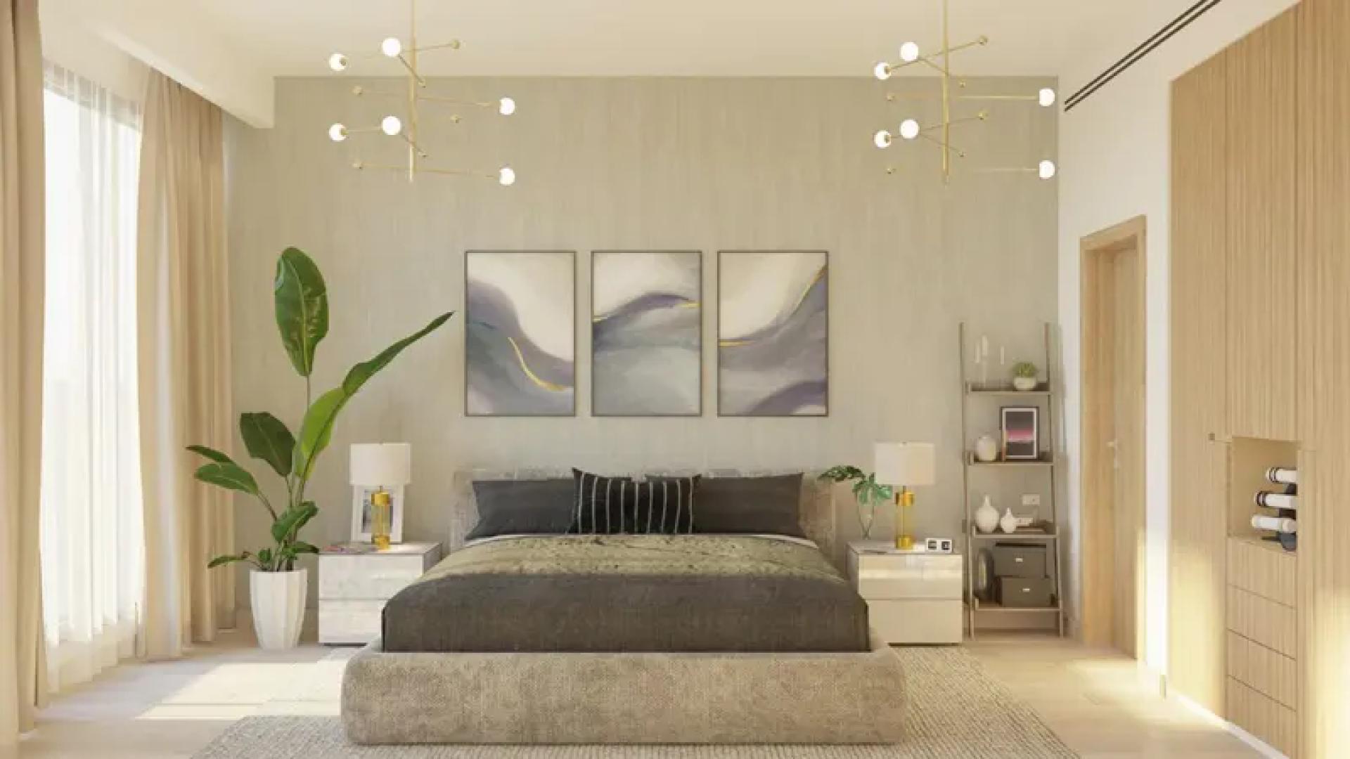 Outdoor pool and basketball court at Aura by Grovy Apartments in JVC, Dubai