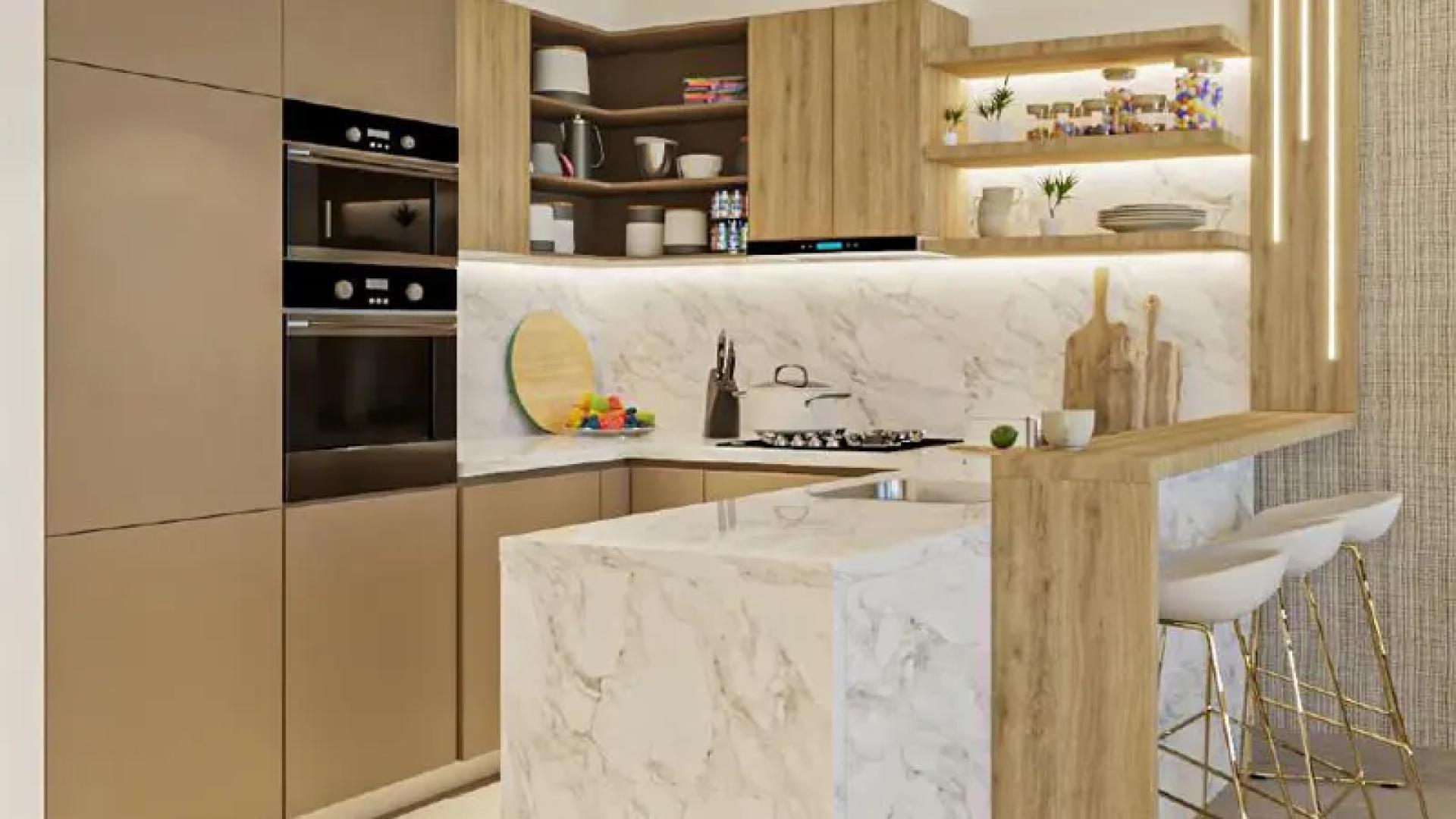 Modern living room and kitchen in 1-bedroom Aura apartment, Jumeirah Village Circle