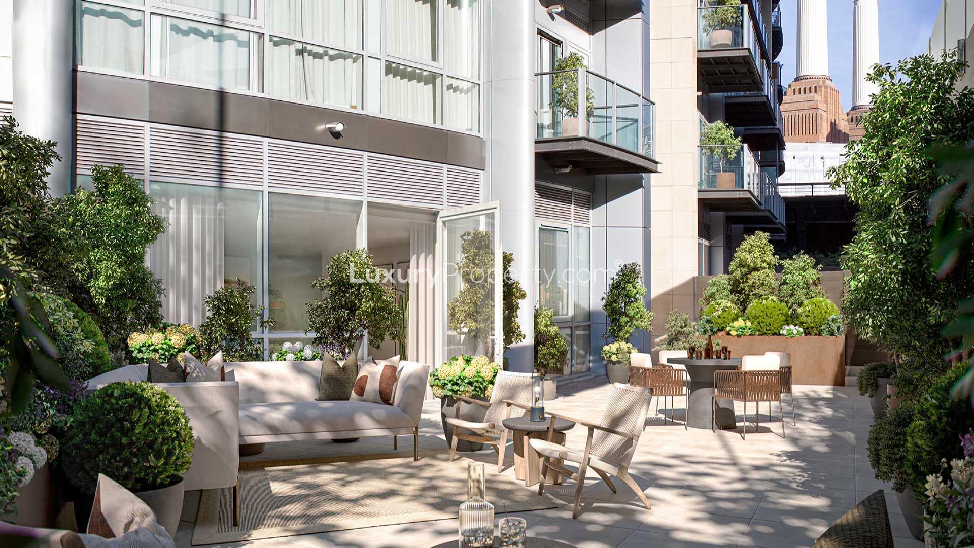 Stylish living room with terrace view in Chelsea Bridge Wharf apartment, London