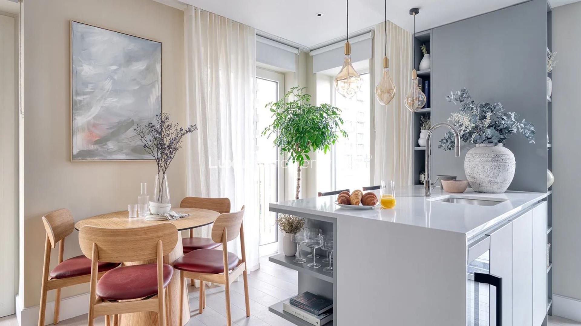 Modern apartment building at The Cascades, White City, London with landscaped gardens