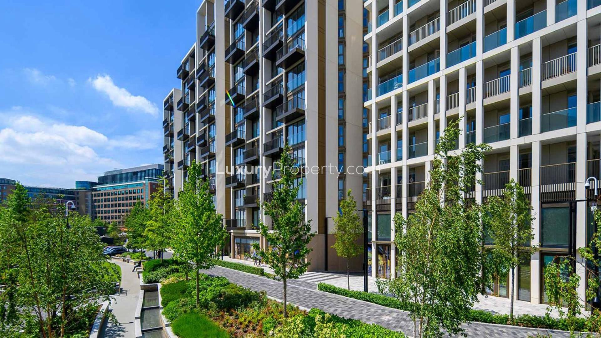 Modern living room and kitchen in The Cascades apartment, White City London for sale