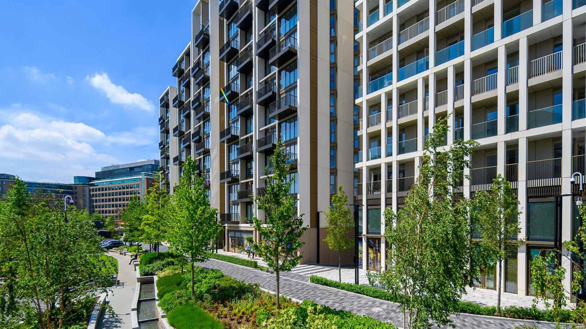 Modern living room and kitchen in The Cascades apartment, White City London for sale