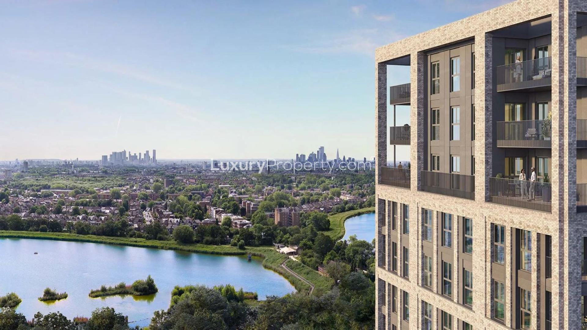 Modern kitchen in Woodberry Down apartment, featuring sleek design and large window views