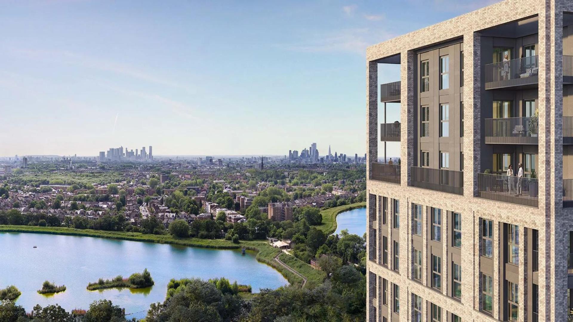 Modern kitchen in Woodberry Down apartment, featuring sleek design and large window views