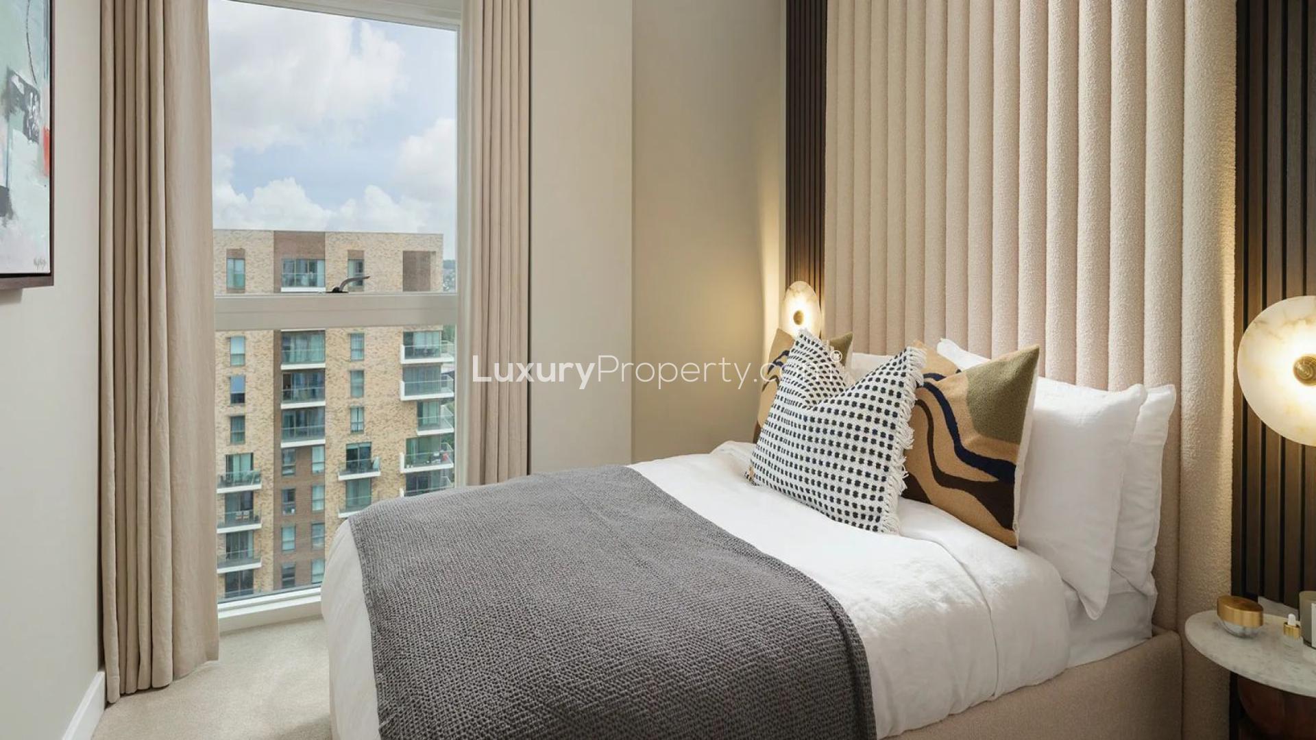 Modern kitchen in Kidbrooke Village apartment with sleek cabinets and dining area
