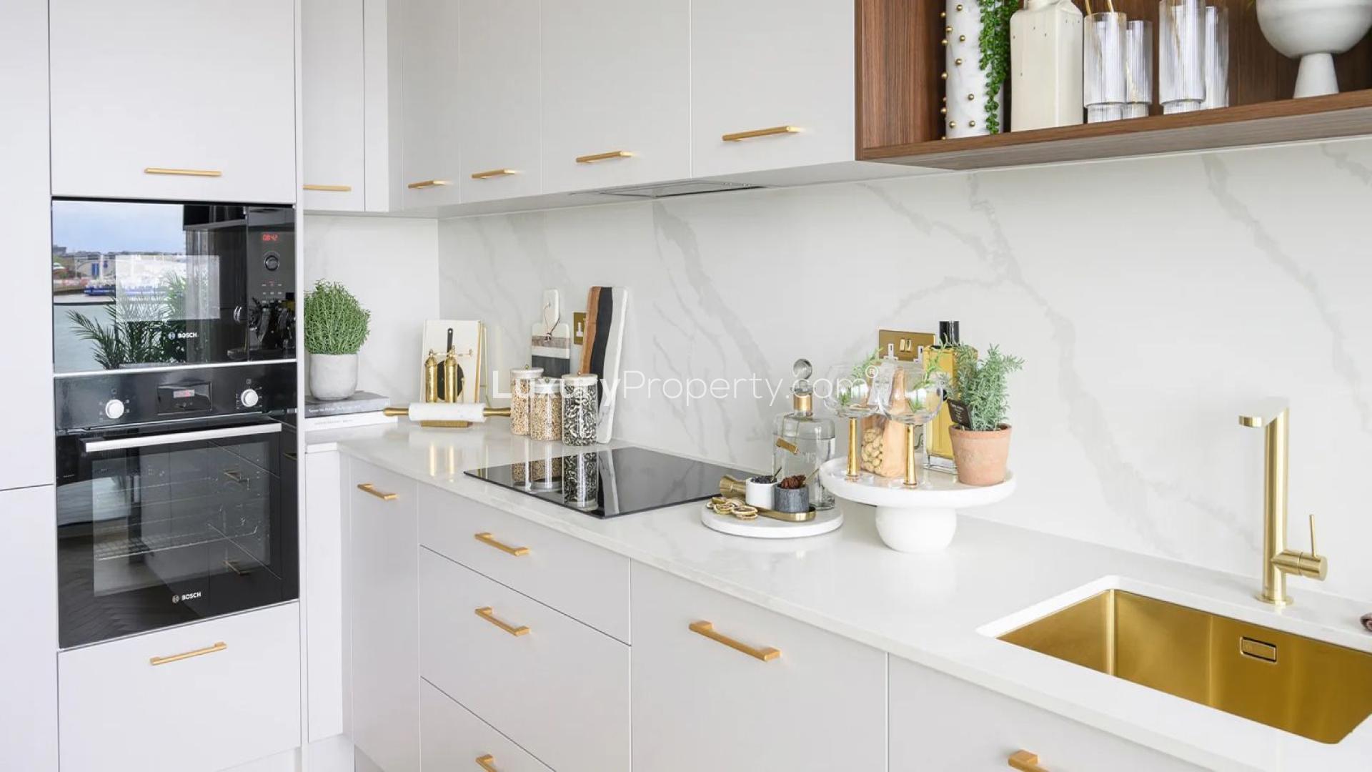 Elegant London apartment living room with garden and river views, modern decor, natural light