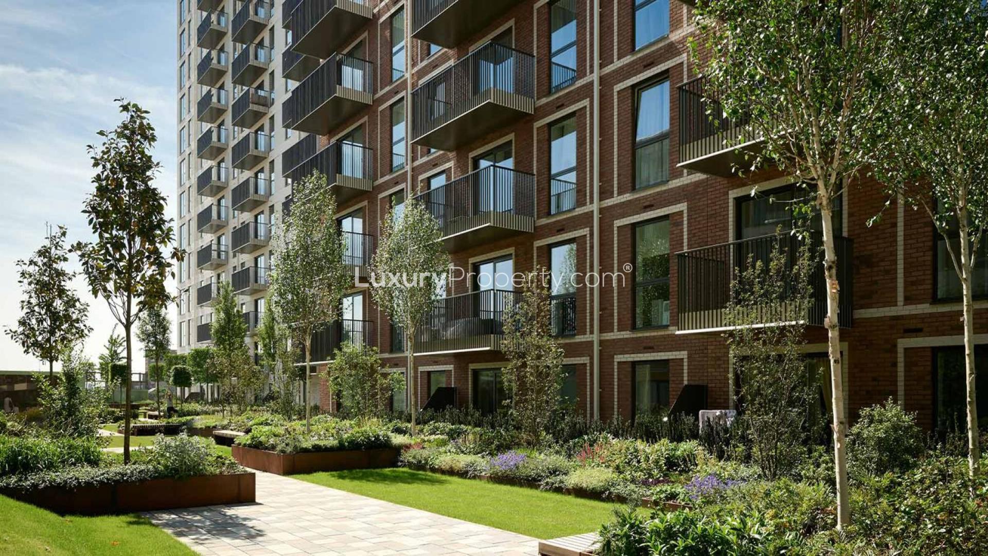 Modern living room in Lindley House apartment, featuring chic decor and balcony view in London