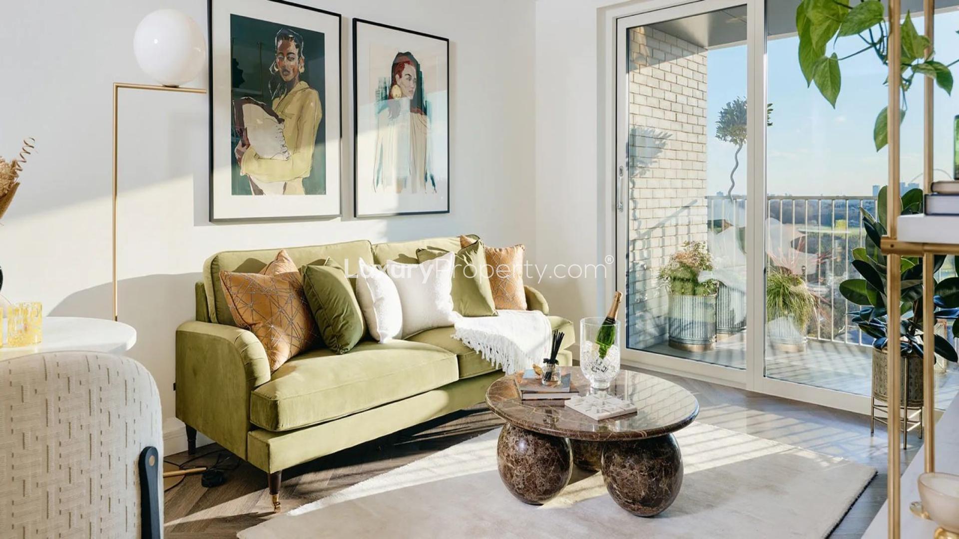 Modern living room in Lindley House apartment, Silkstream, London. Stylish decor with open kitchen