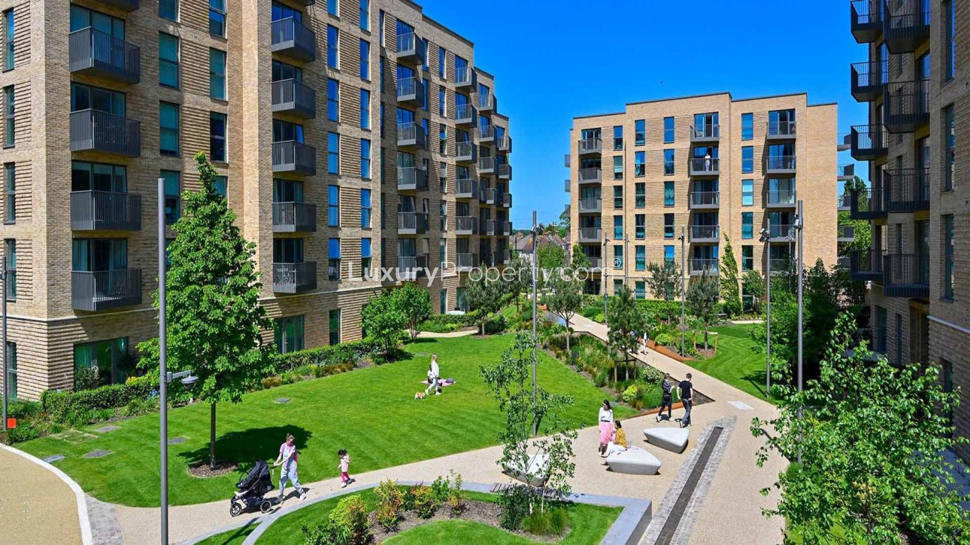 "Stylish one-bedroom apartment interior at Horlicks Quarter, London, featuring modern decor and dining area.",Modern apartment buildings with green courtyard in Horlicks Quarter, London, for sale