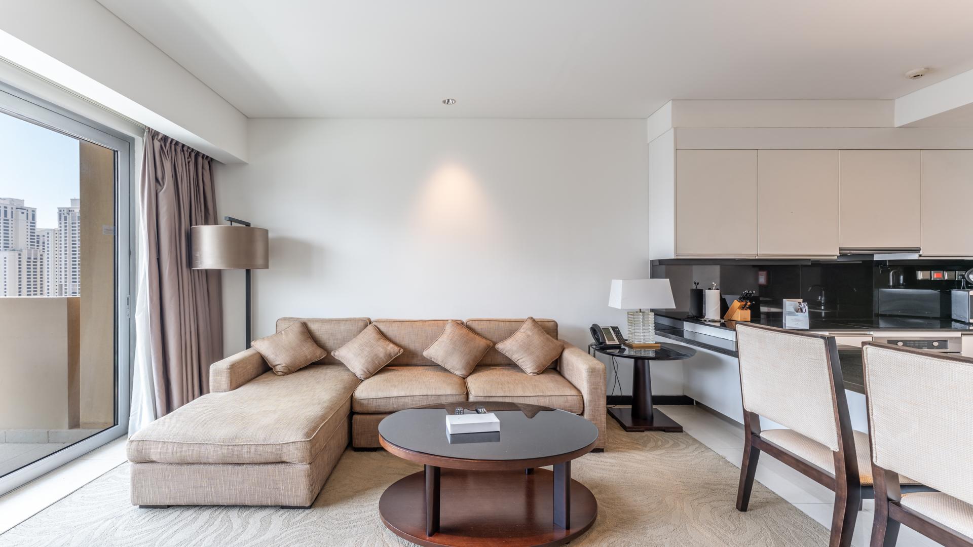 Modern 1-bedroom apartment with full Marina view, open-plan living, and kitchen in Dubai Marina