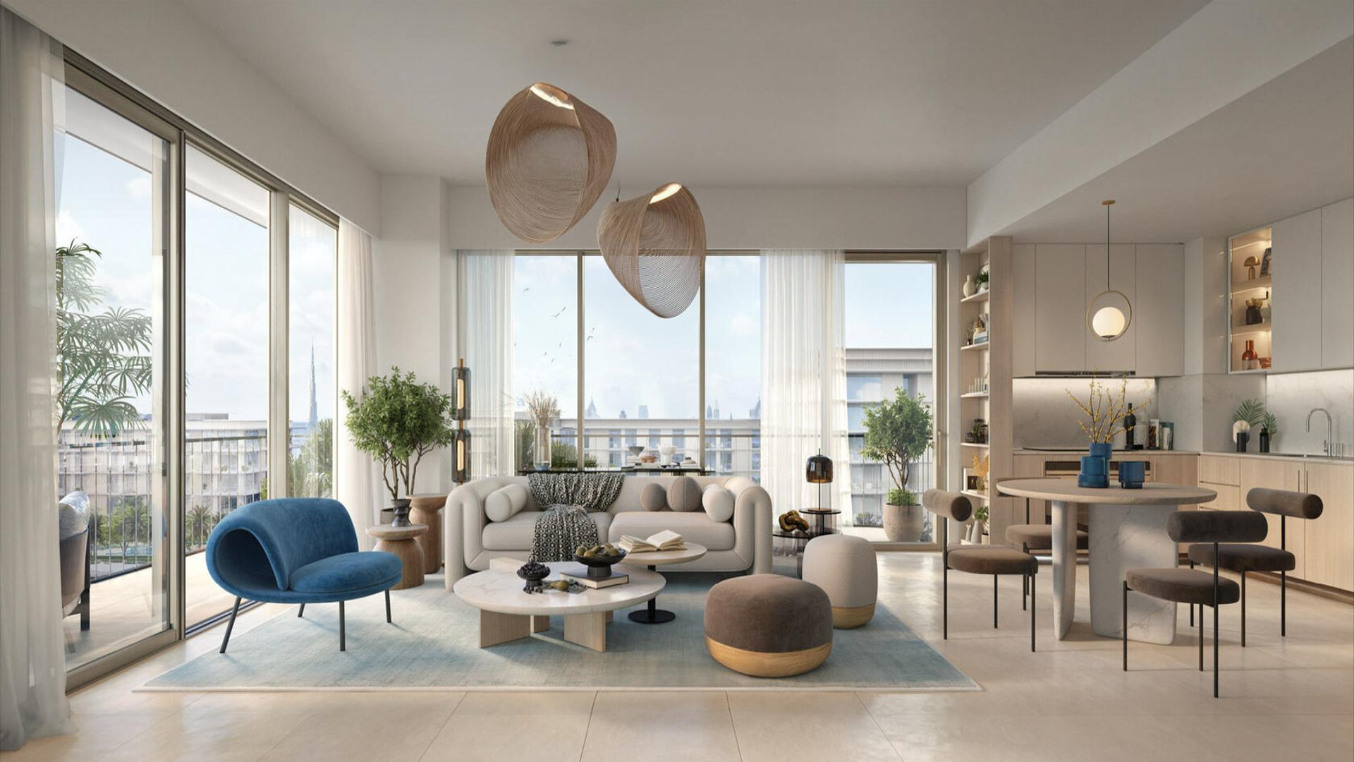 Modern apartment balconies overlooking pool and greenery in Bayline, Mina Rashid community