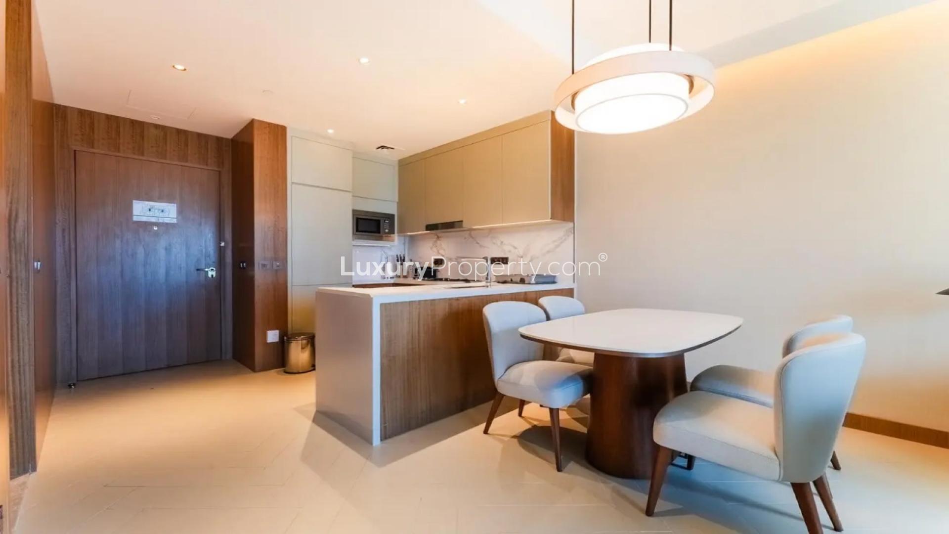Modern bedroom in Address Residences Dubai Opera apartment, Downtown, with city view