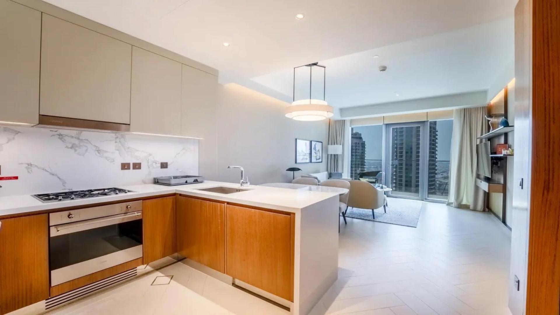 Modern living room in Address Residences Dubai Opera apartment, Downtown, featuring elegant decor