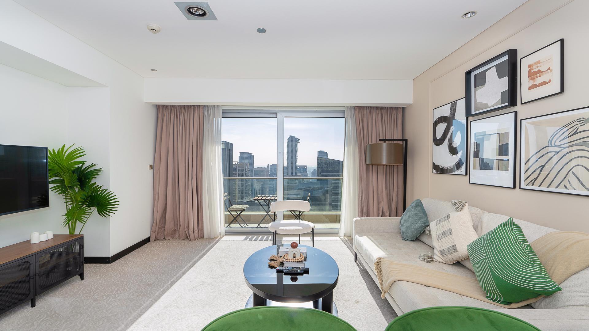 High floor furnished apartment living room with balcony view in JW Marriott Dubai Marina