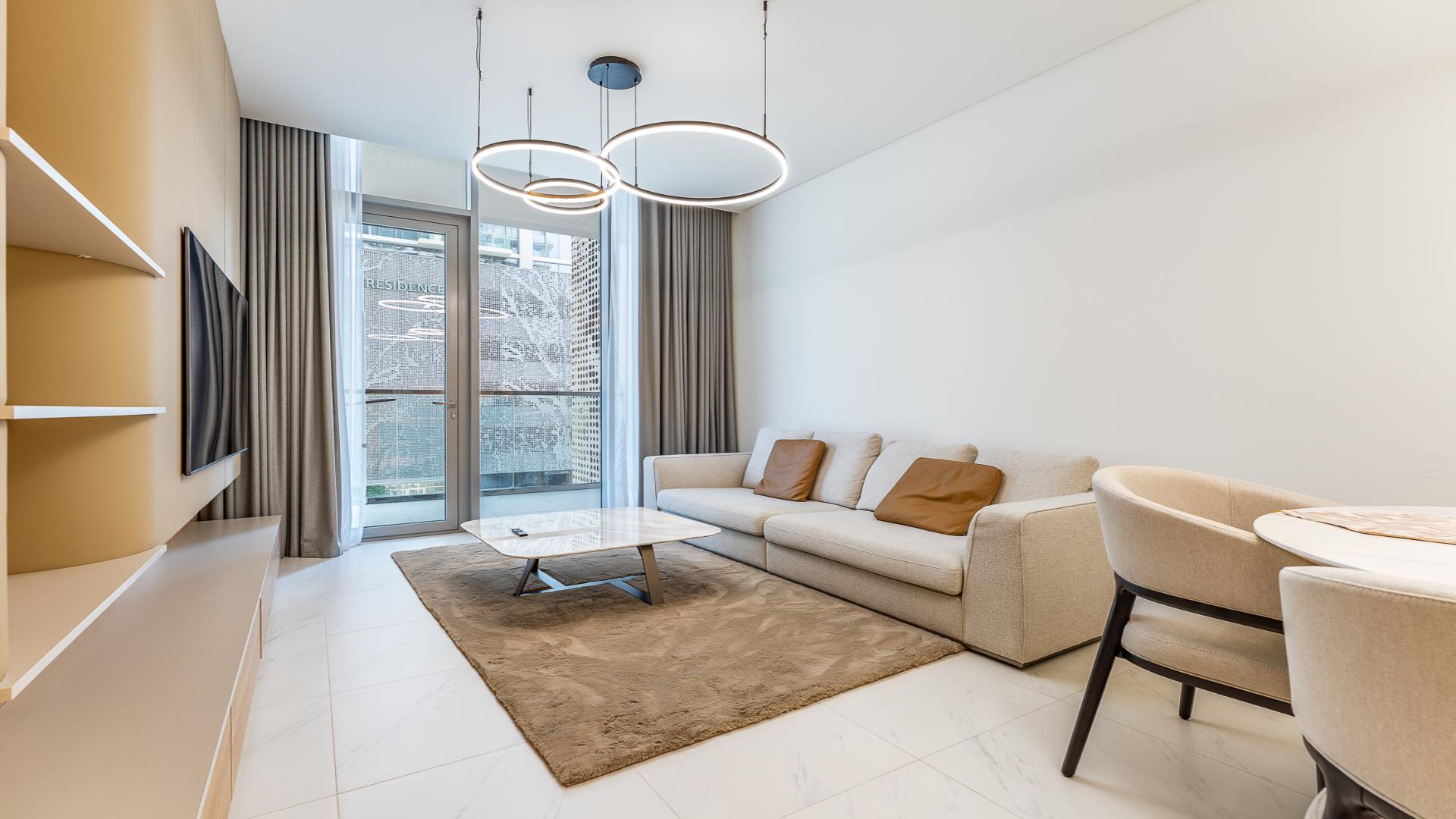 Furnished apartment interior with modern dining area in District One Residences, Mohammad Bin Rashid City